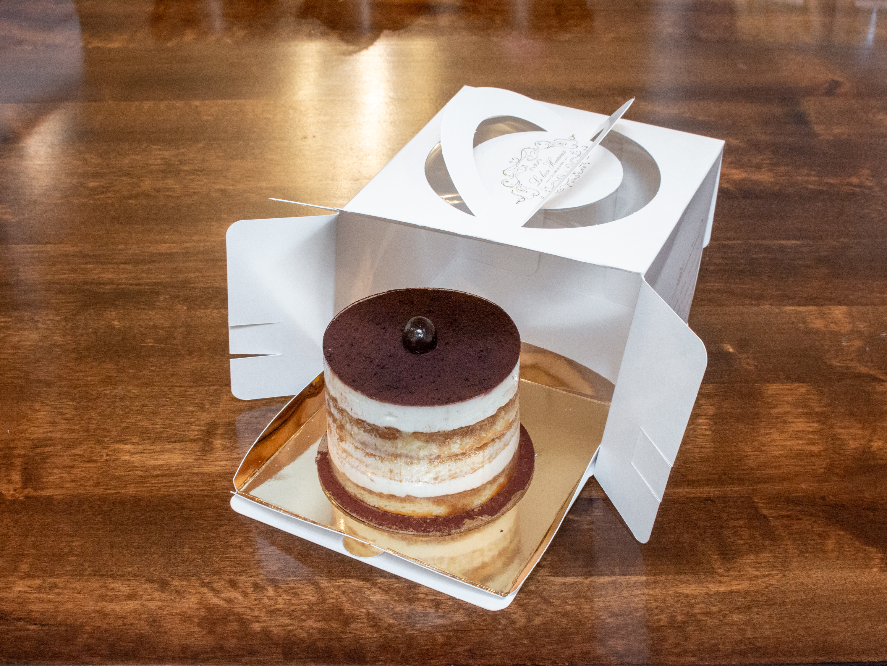Order Tiramisu Mini Cake food online from Knead Bakery And Cafe store, Schaumburg on bringmethat.com