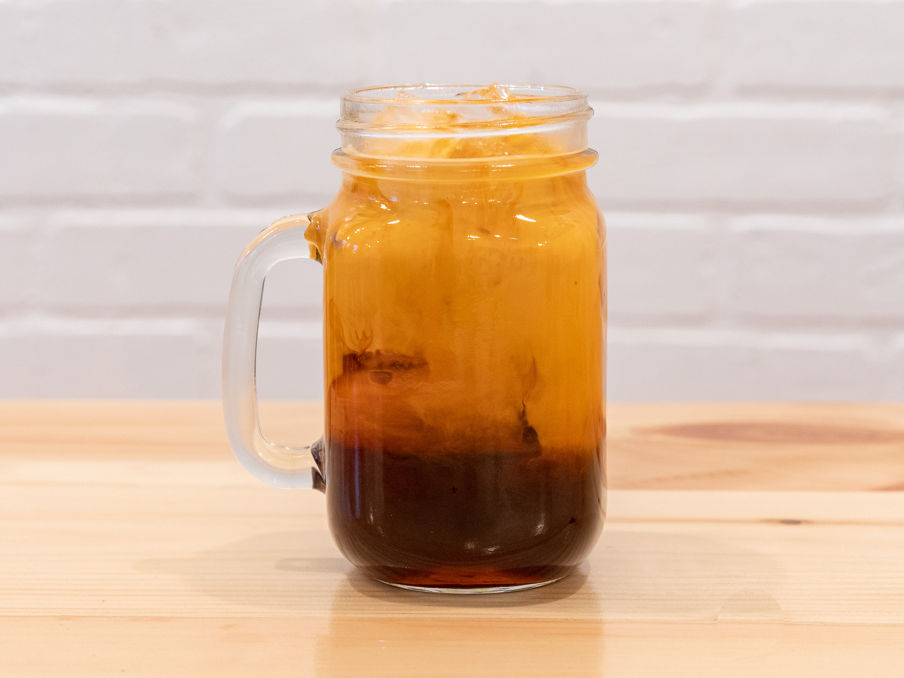 Order 60. Thai Iced Tea food online from Thai Saap kitchen store, Quincy on bringmethat.com