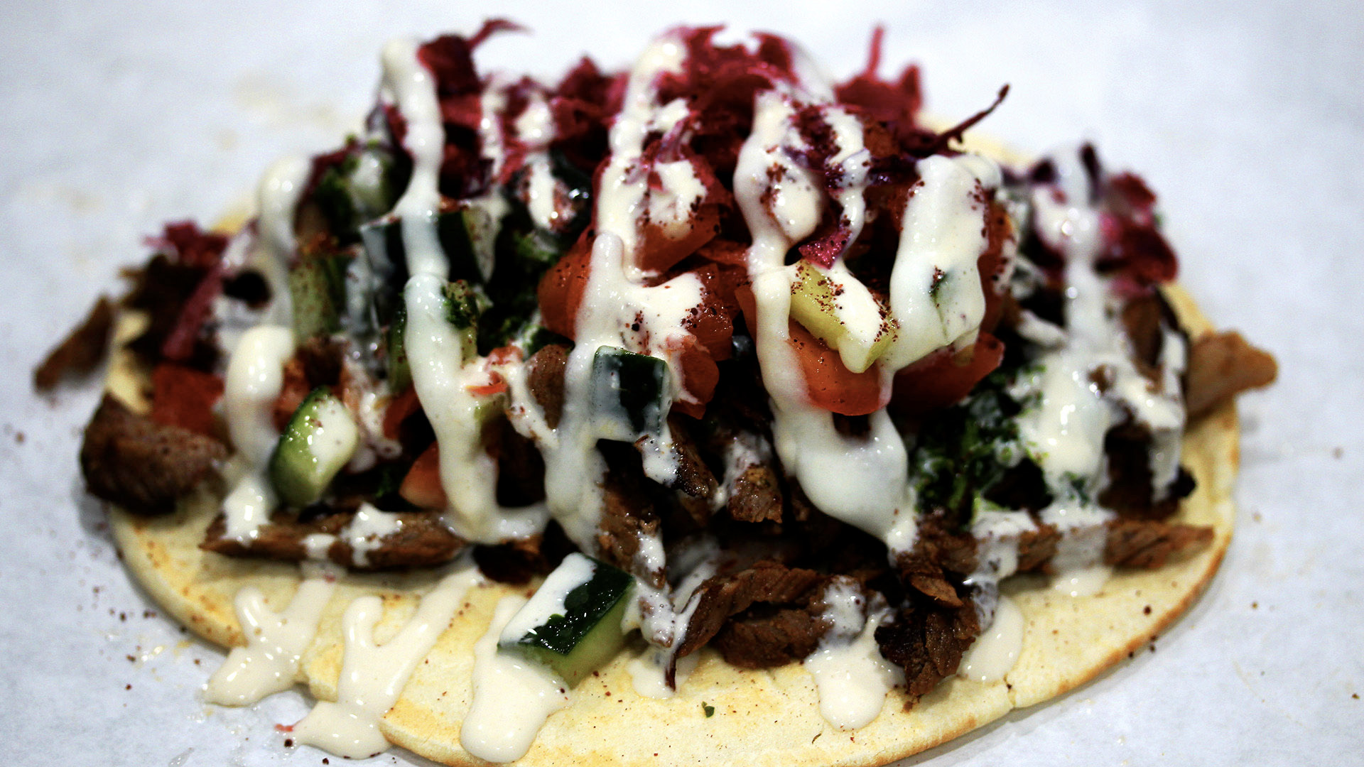 Order Beef Tri -Tip and Lamb Sandwich food online from Pita Guys store, San Marcos on bringmethat.com