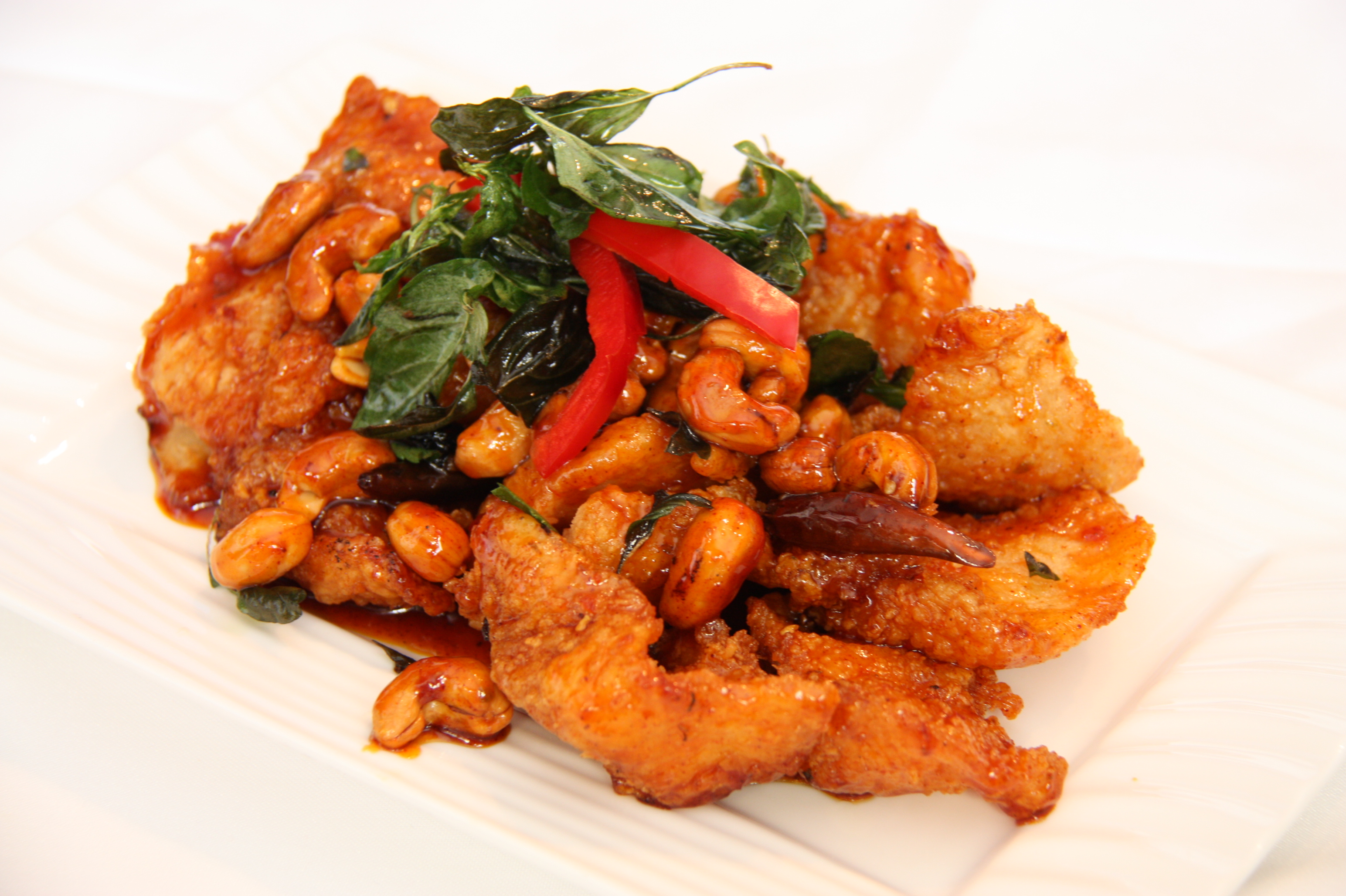 Order Fried Fish with Tamarind Sauce and Cashew Nut food online from Ploy Ii-Thai Cuisine store, San Francisco on bringmethat.com
