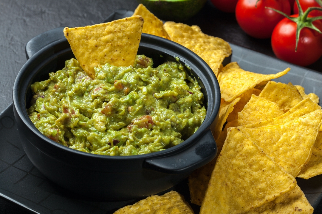 Order Large Guacamole w/ Chips food online from Oaxaca taqueria store, New York on bringmethat.com