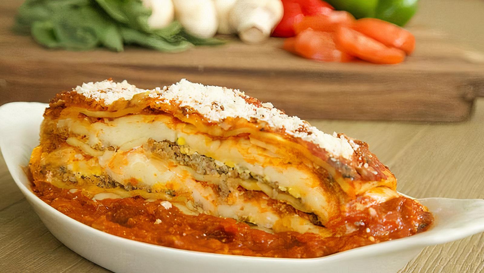 Order Lasagna food online from Toto's Pizzeria & Restaurant store, Belmont on bringmethat.com