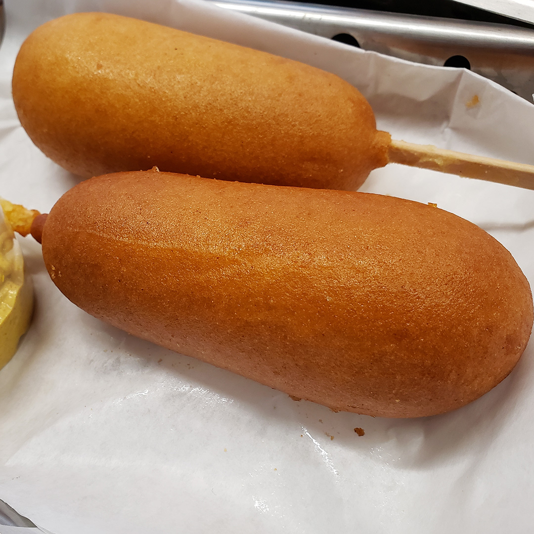 Order Two (2) Corn Dogs food online from Mad Madelines Grill store, Temecula on bringmethat.com
