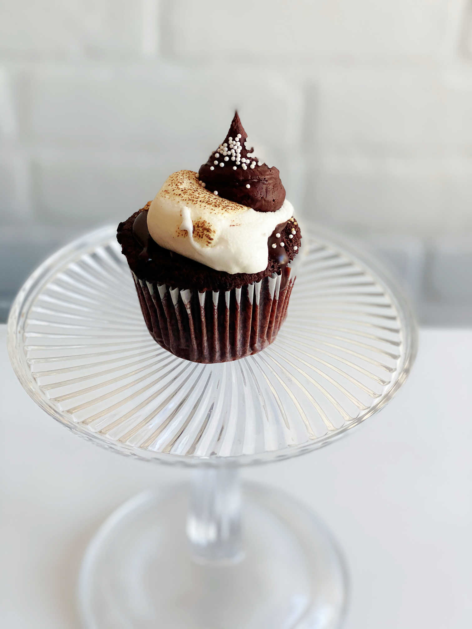 Order S'mores Cupcake food online from Sugar Blossom Bake Shop store, San Clemente on bringmethat.com