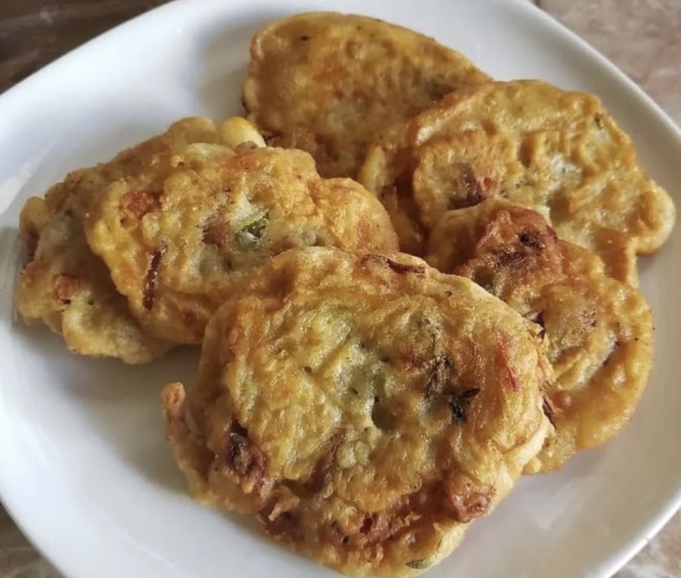 Order SALTFISH CODFISH FRITTERS food online from Paradise Jamaican Cuisine store, Morrisville on bringmethat.com