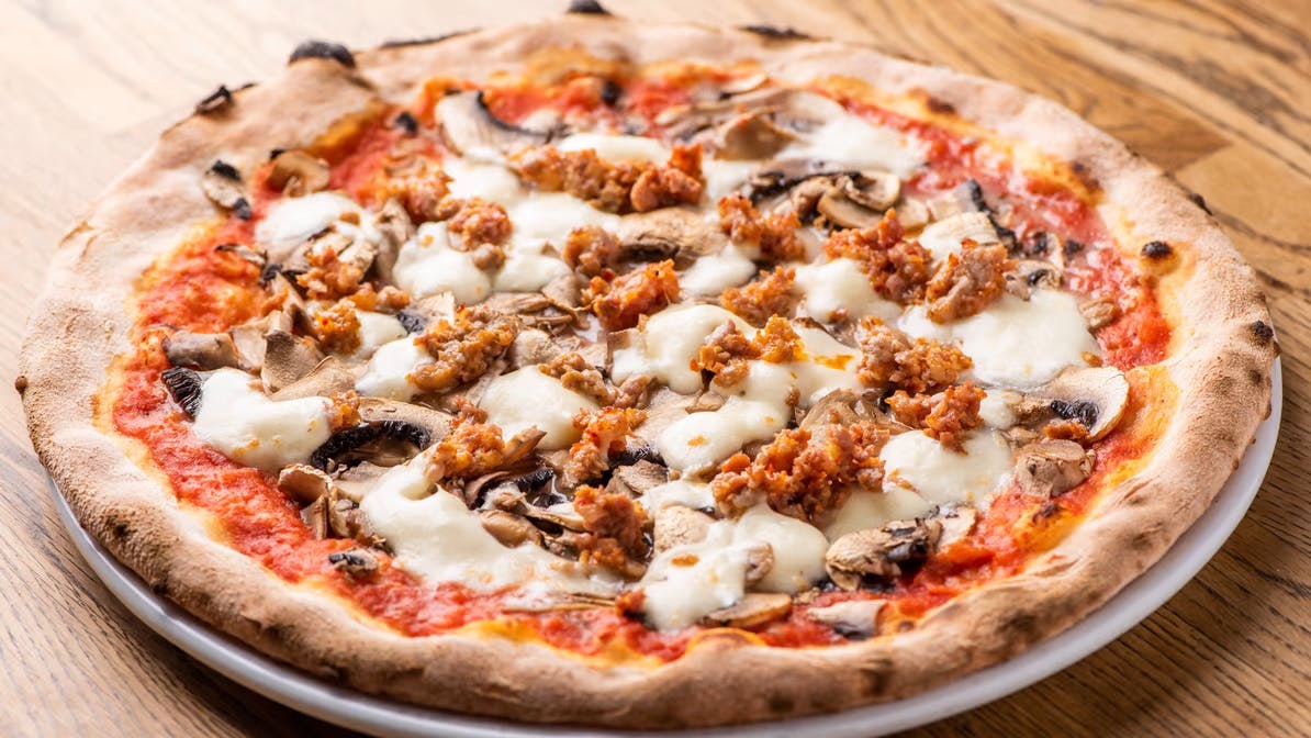 Order Pizza Funghi & Salsiccia - Individual 12" food online from Broccolino Pizza store, Brooklyn on bringmethat.com