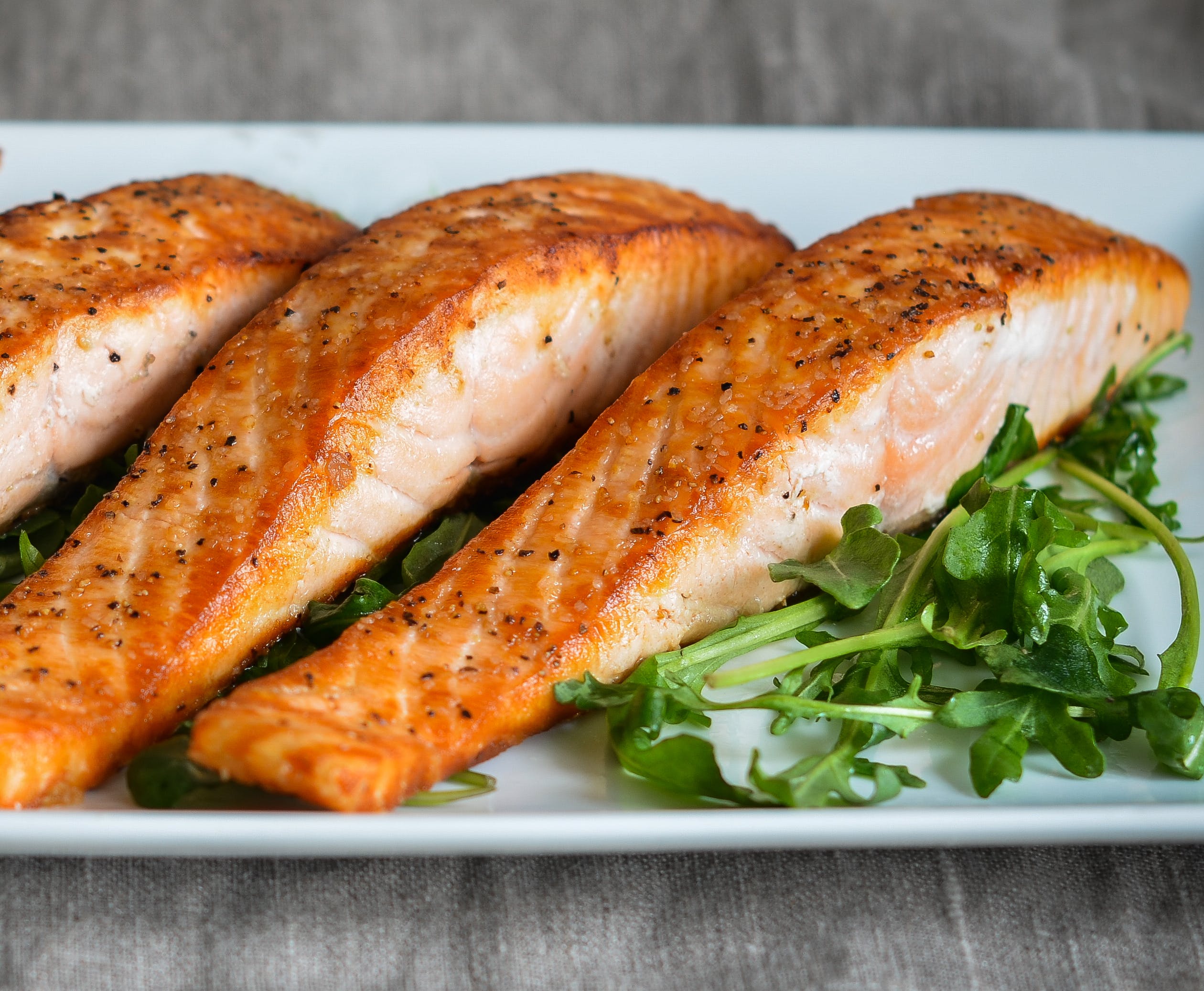 Order Salmon - Entree food online from Flames Woodfire Pizza store, Elmsford on bringmethat.com