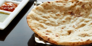 Order Peshawari Naan food online from Tiffin store, Wynnewood on bringmethat.com