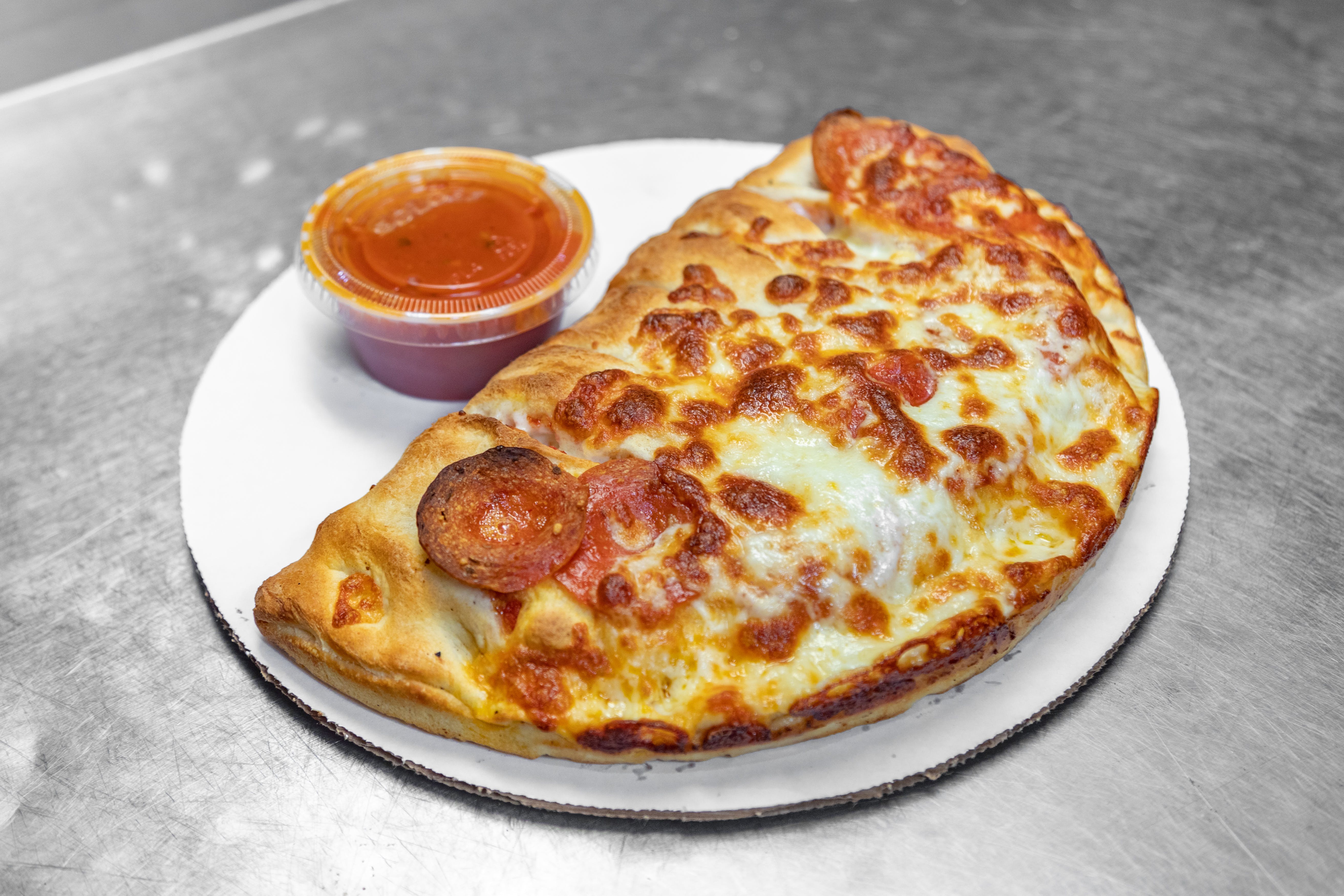 Order Build Your Own Calzone - Small food online from Campus Pizza store, Hartford on bringmethat.com