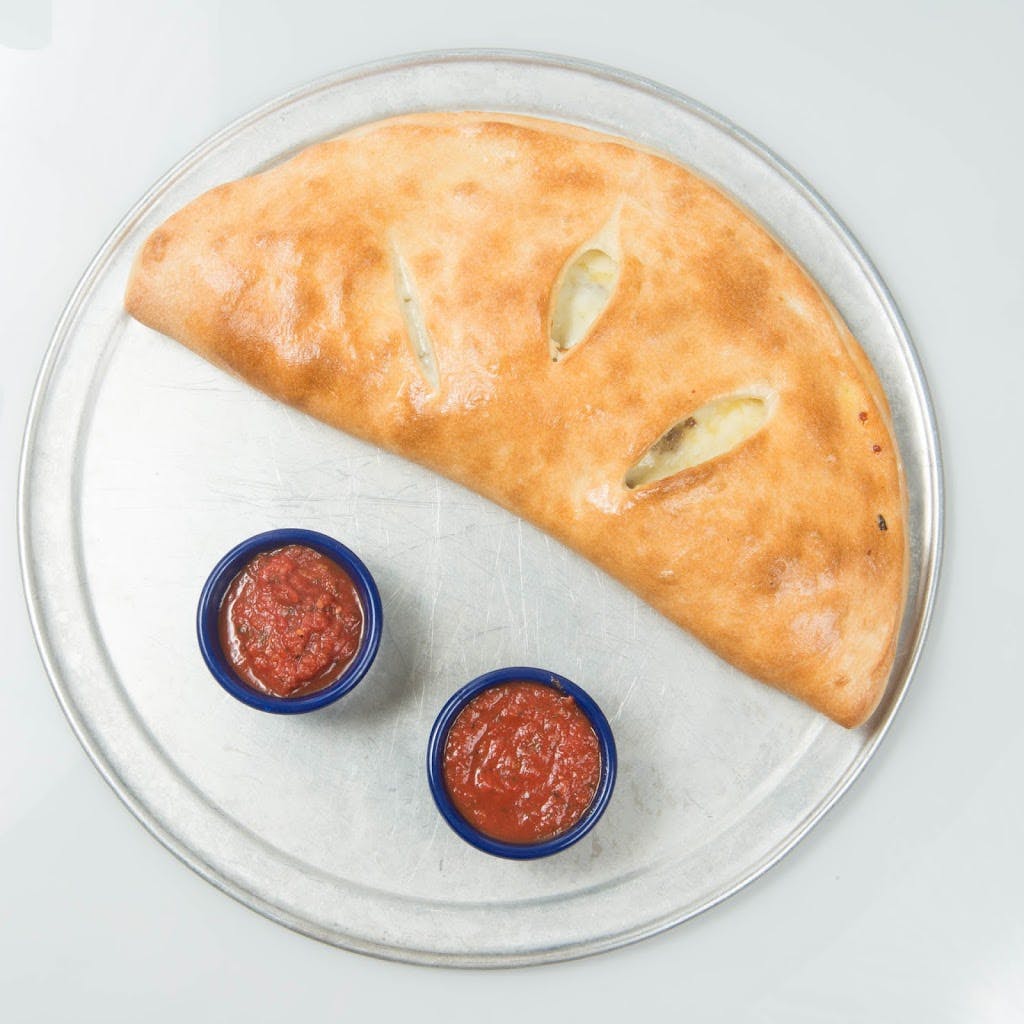 Order Cheese Calzone - Calzone food online from Zeno Italian Grill store, Pembroke on bringmethat.com