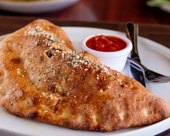 Order New York Calzone food online from Anthony's Pizzeria store, Houston on bringmethat.com