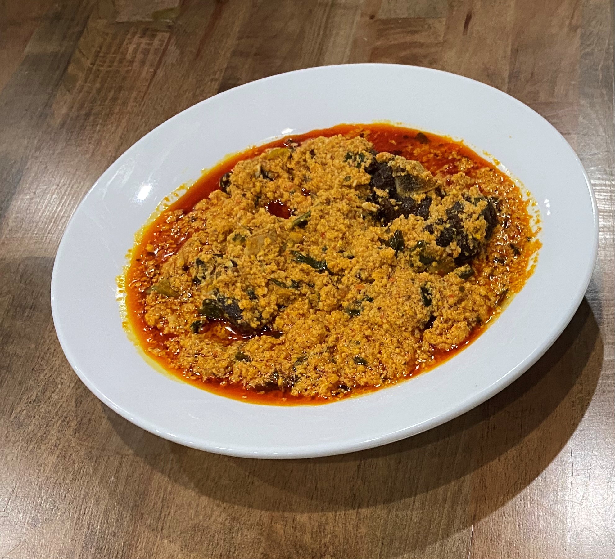 Order Egusi Soup food online from Fusion Vibes Kitchen + Bar store, Richardson on bringmethat.com