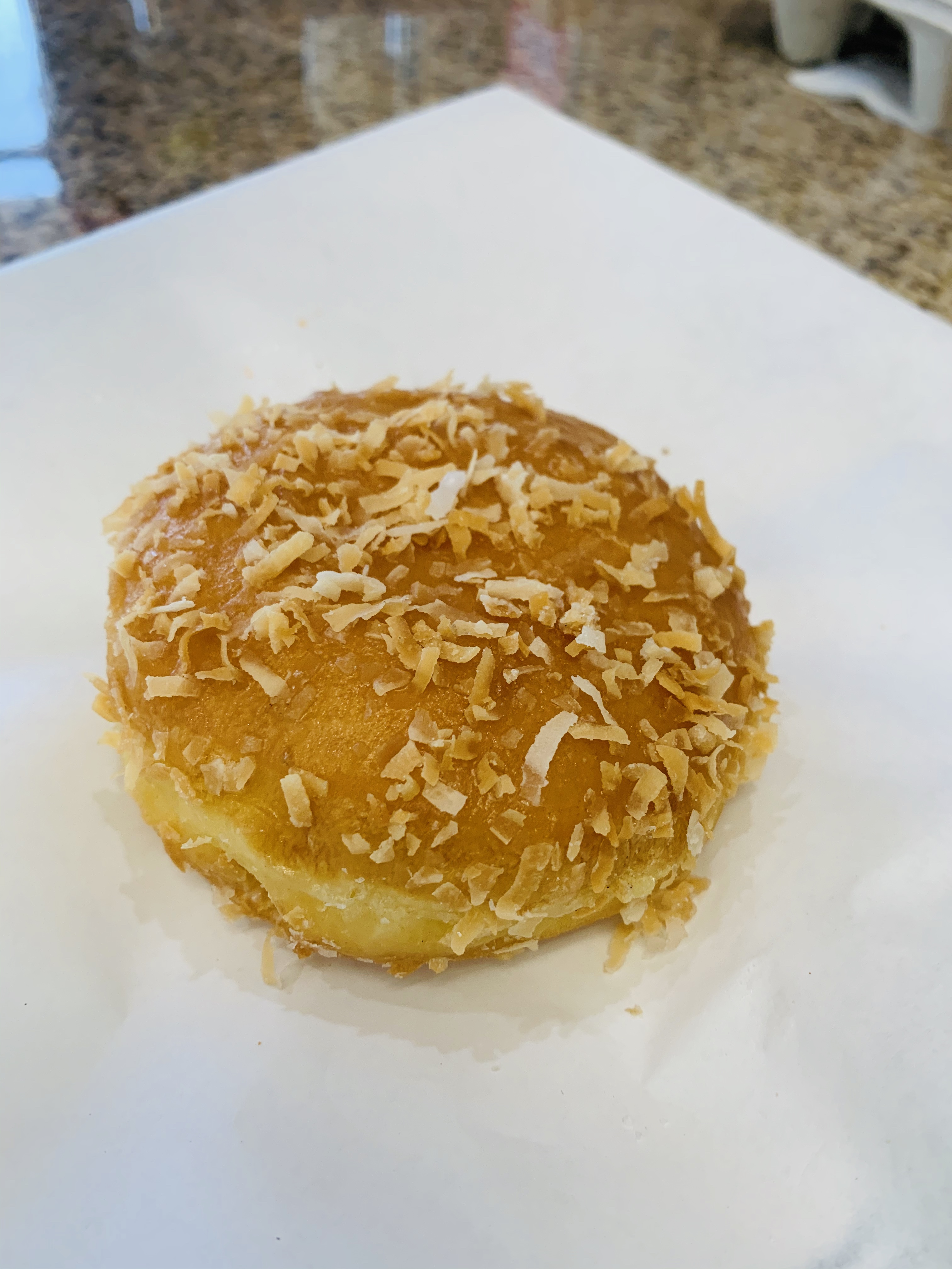 Order Coconut Cream Filled food online from Bosa Donuts store, Surprise on bringmethat.com