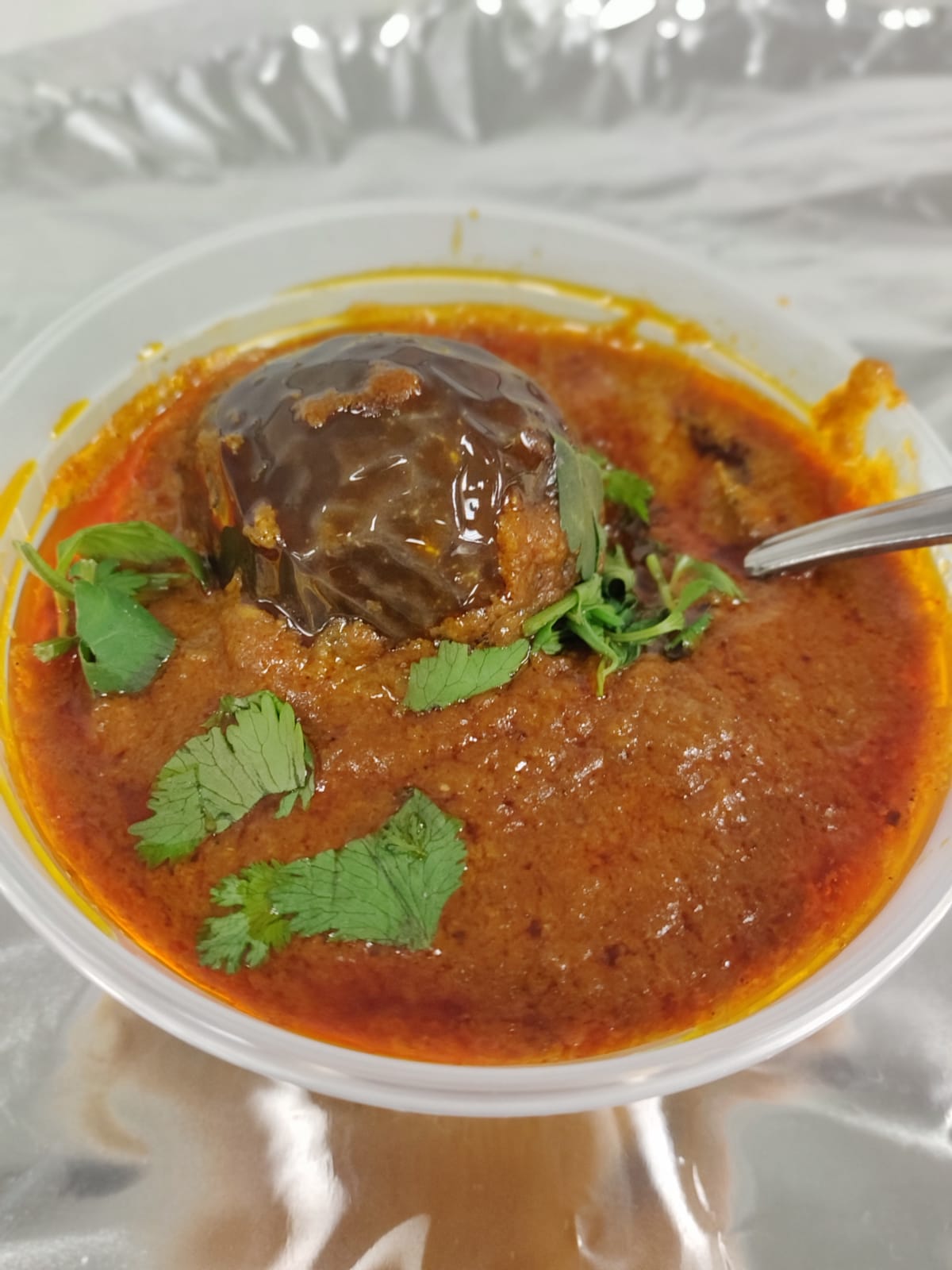Order Guthi Vankaya Curry food online from Hyderabad Biryani House store, Rochester on bringmethat.com