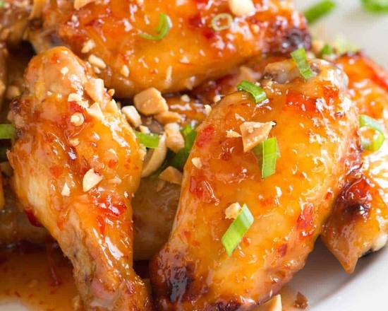 Order Sweet Chilly Sauce Wings  food online from Sagres Bar & Grill store, Newark on bringmethat.com