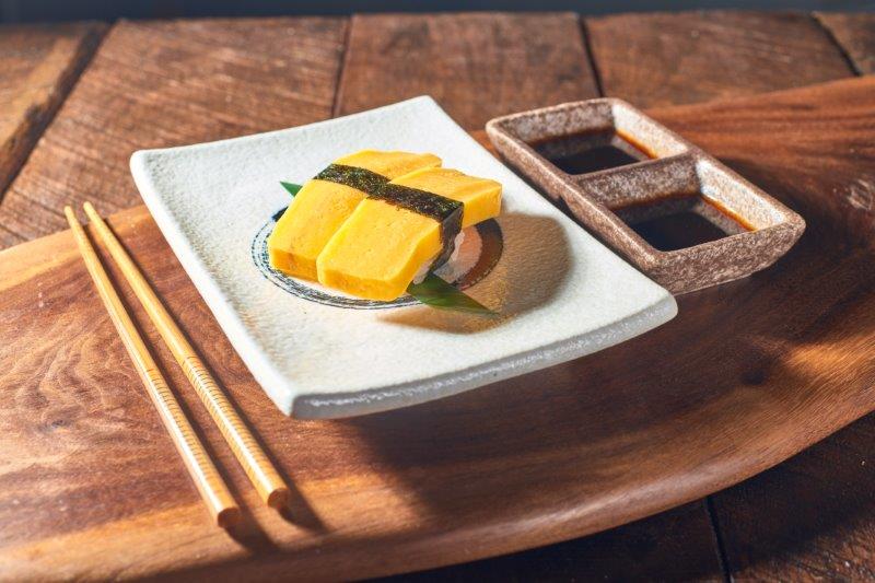 Order Tamago Nigiri food online from Rocket Sushi store, San Francisco on bringmethat.com