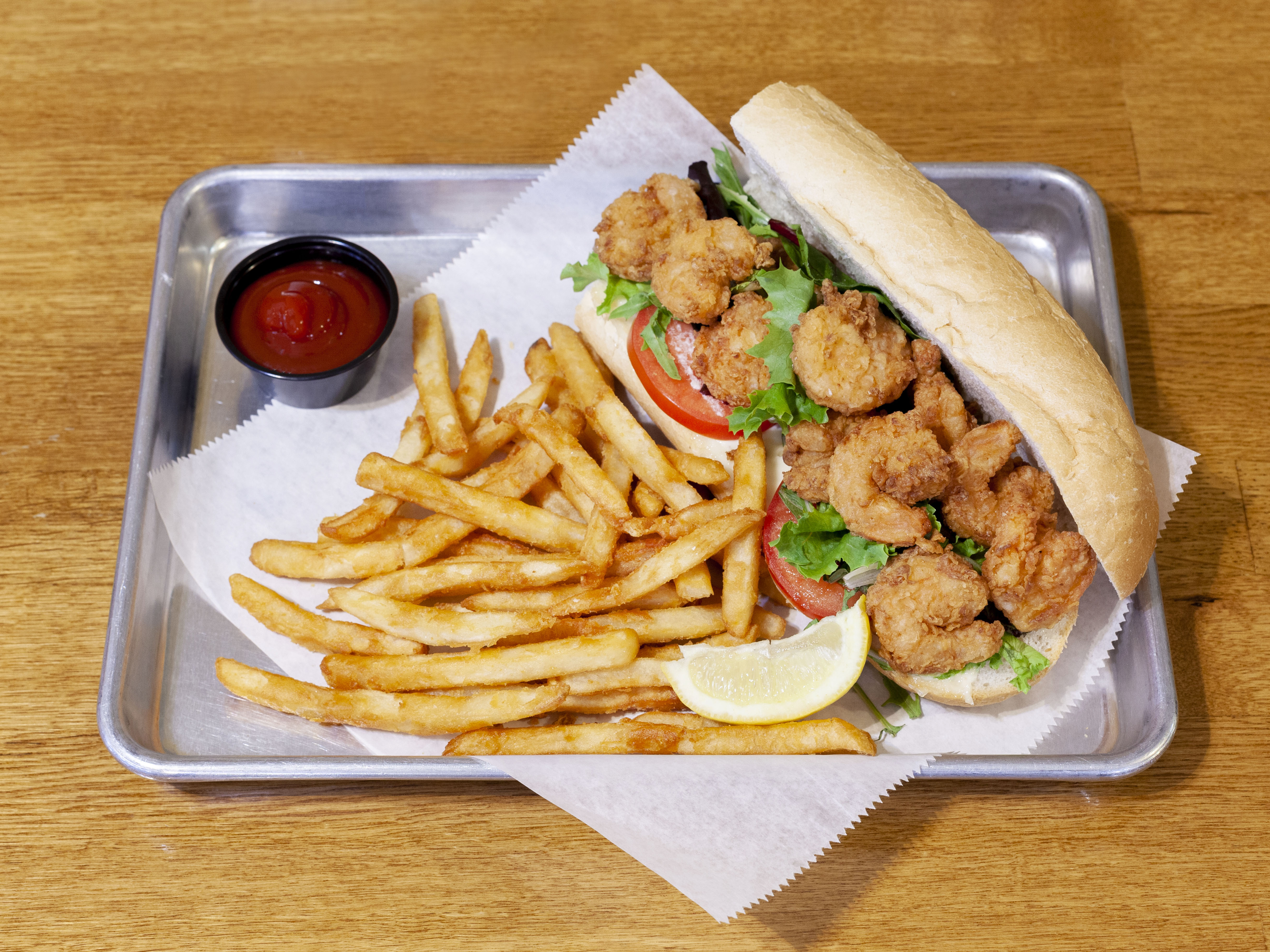 Order Shrimp Poboy and Fries food online from Taste of Louisiana (TOLA) Cafe store, Denham Springs on bringmethat.com