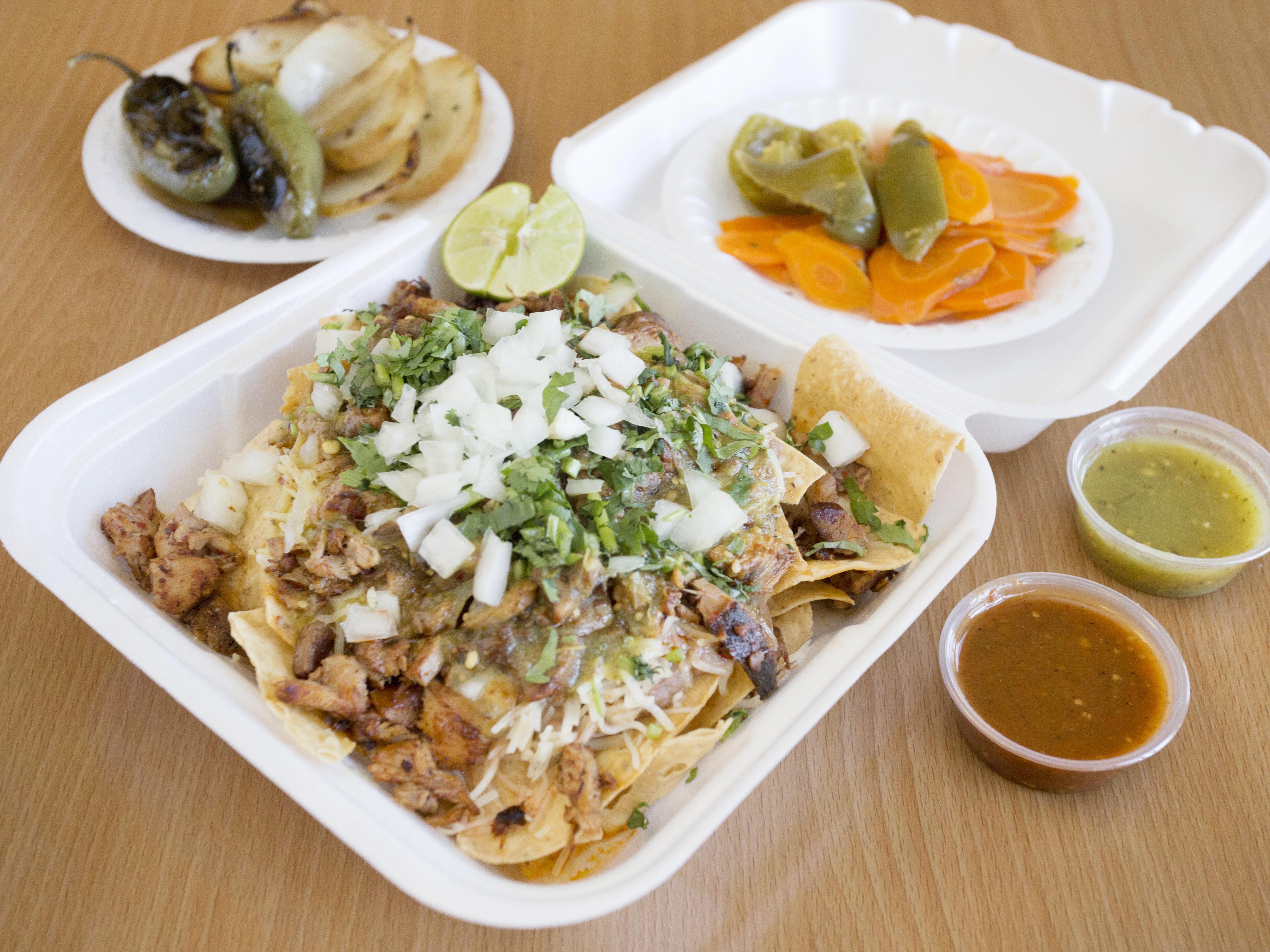 Order Nachos with Meat food online from Tacos El Juanito store, Ontario on bringmethat.com
