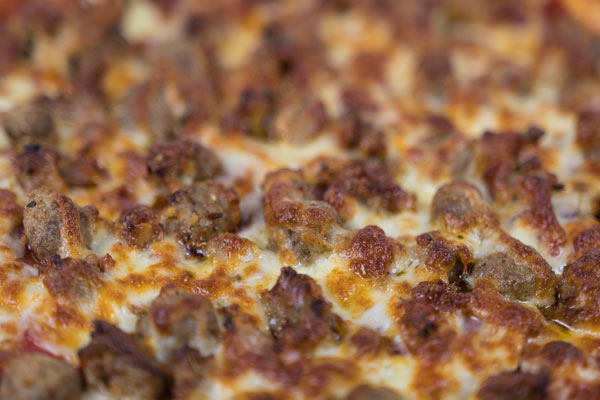 Order Meat Pizza food online from Gionino's Pizzeria store, Orrville on bringmethat.com
