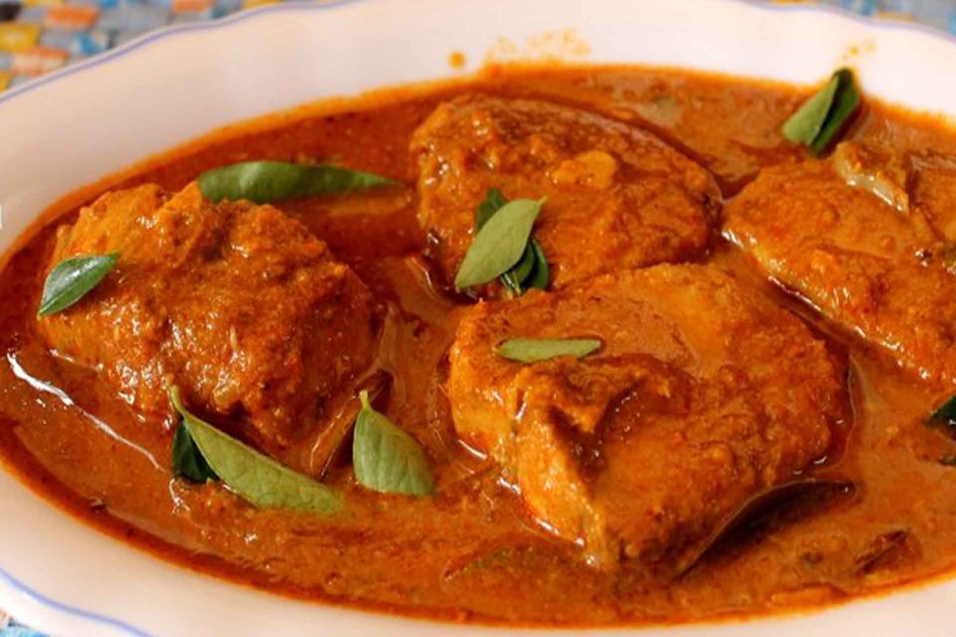 Order Fish Moulli Curry food online from Guru Palace store, North Brunswick on bringmethat.com