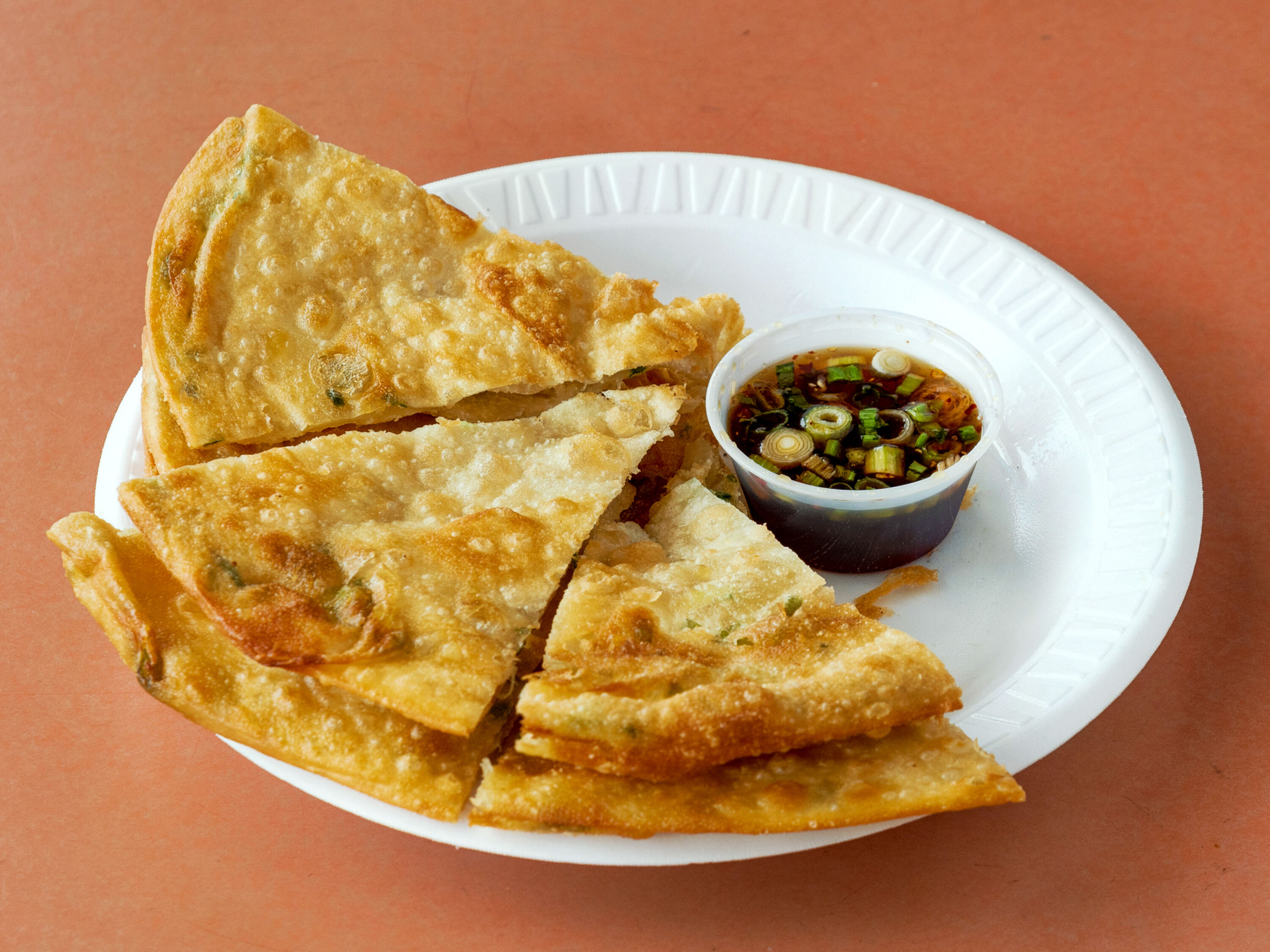 Order 1 Piece Scallion Pie food online from May S Cafe Chinese Food store, Medford on bringmethat.com
