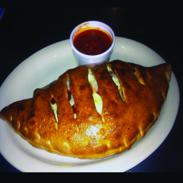 Order Sausage Calzone food online from NY Pizzeria store, Arlington on bringmethat.com
