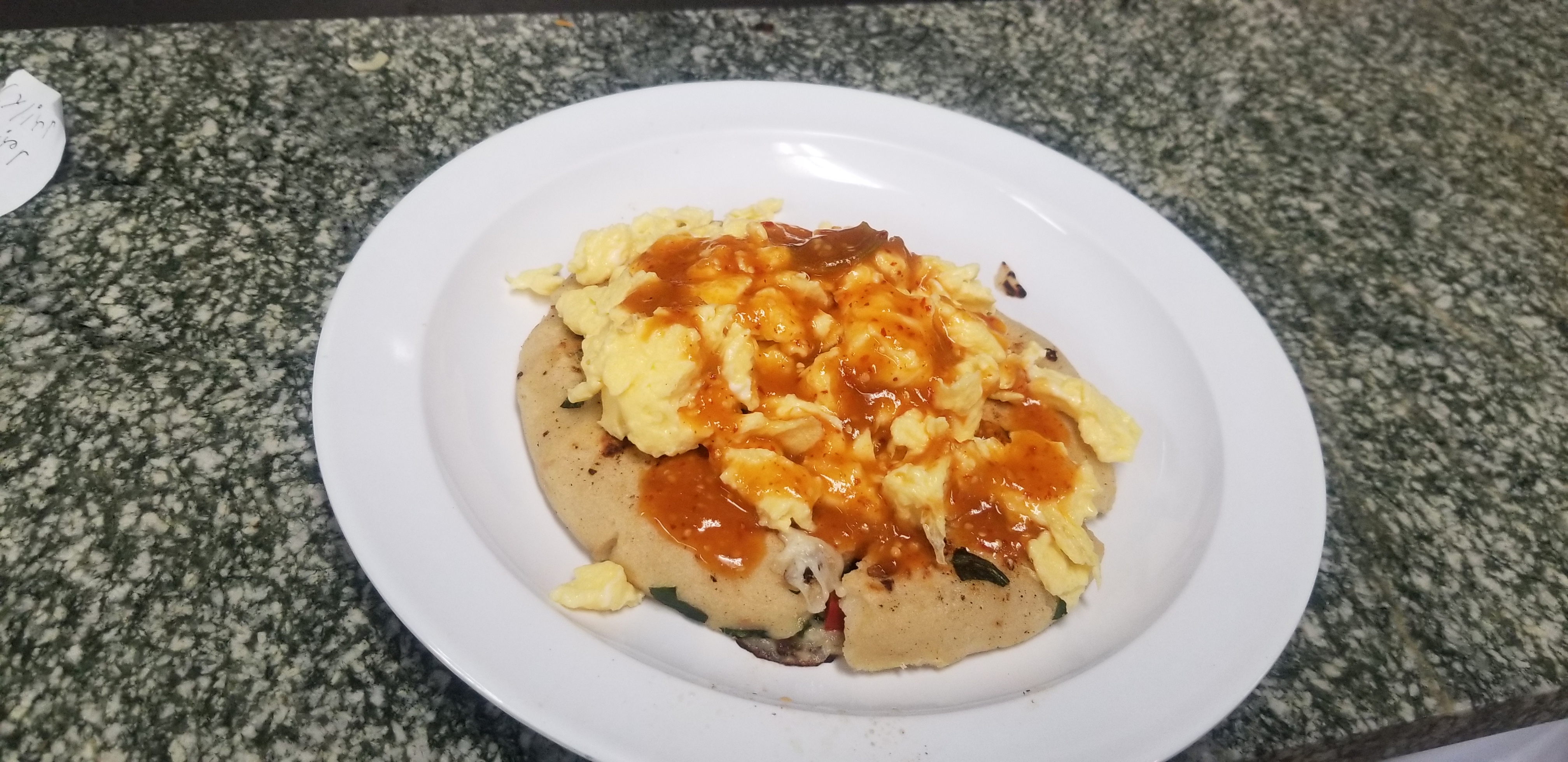 Order BREAKFAST PUPUSA WITH BEANS AND CHEESE & TOPPED WITH SCRAMBLE EGGS. food online from El Taco Chico store, Oak Park on bringmethat.com