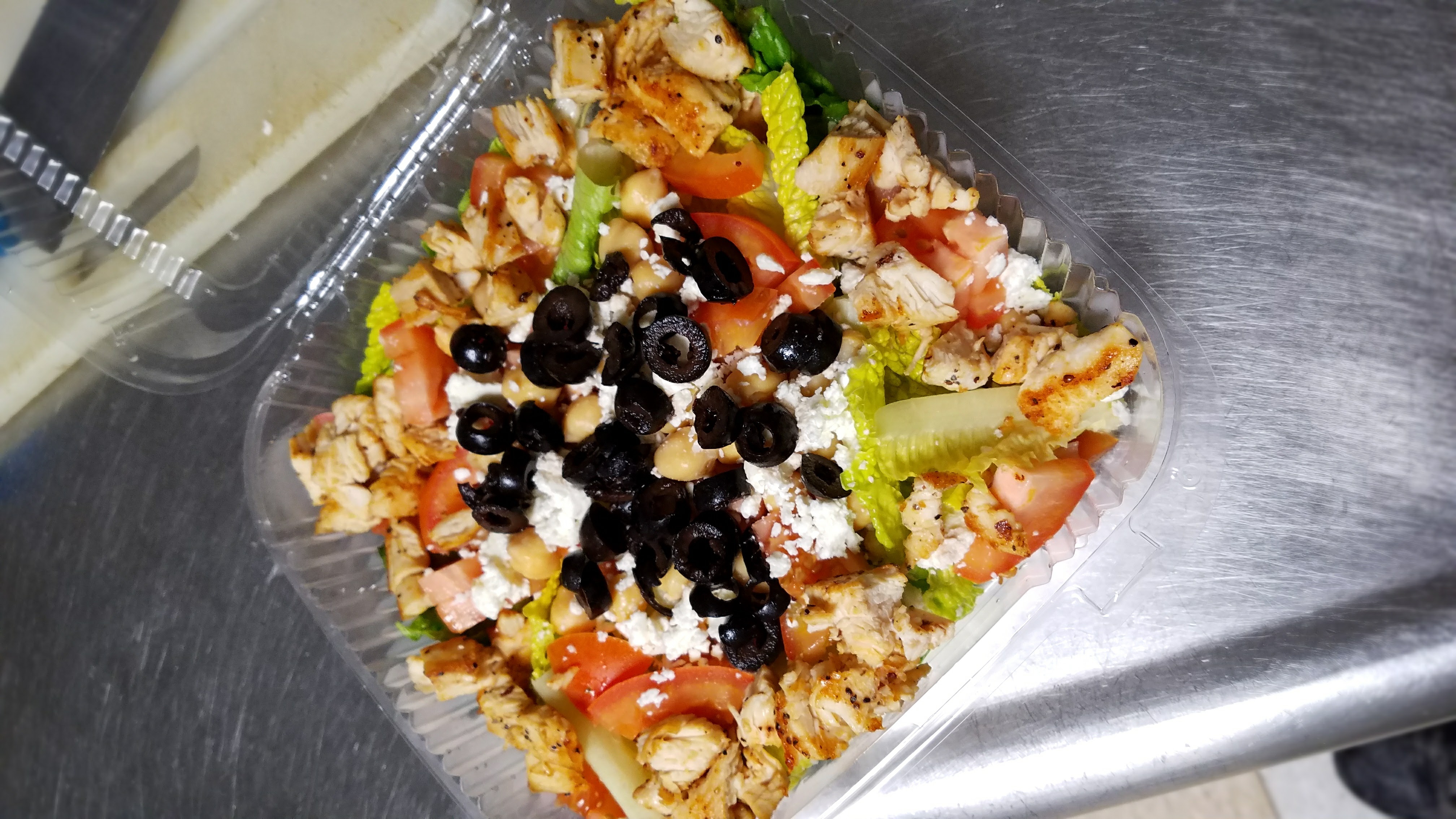 Order Greek Grilled Chicken Salad food online from Nino's Pizza store, Boston on bringmethat.com