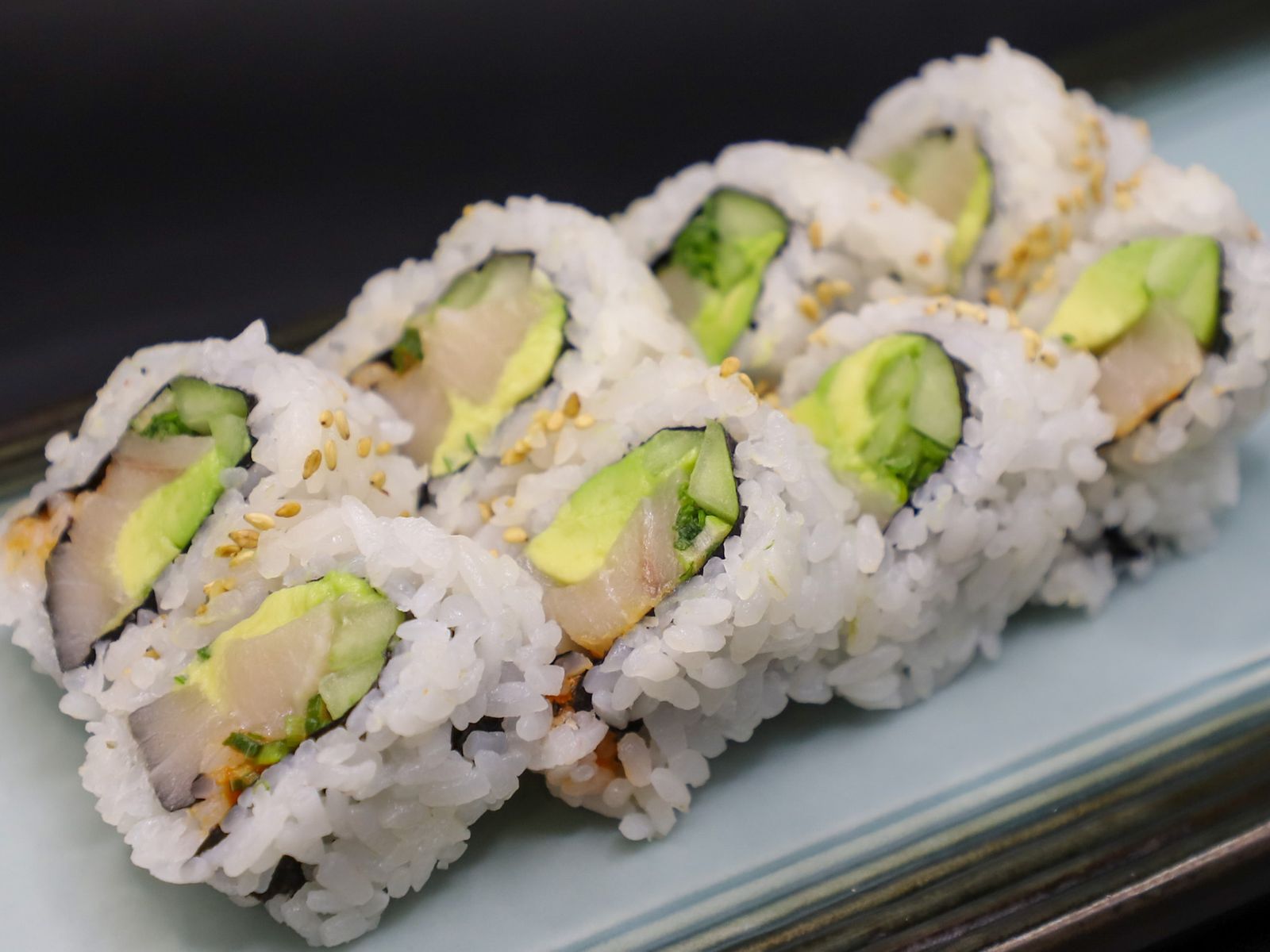 Order Yellowtail Roll food online from Tom's Sushi House store, Los Angeles on bringmethat.com