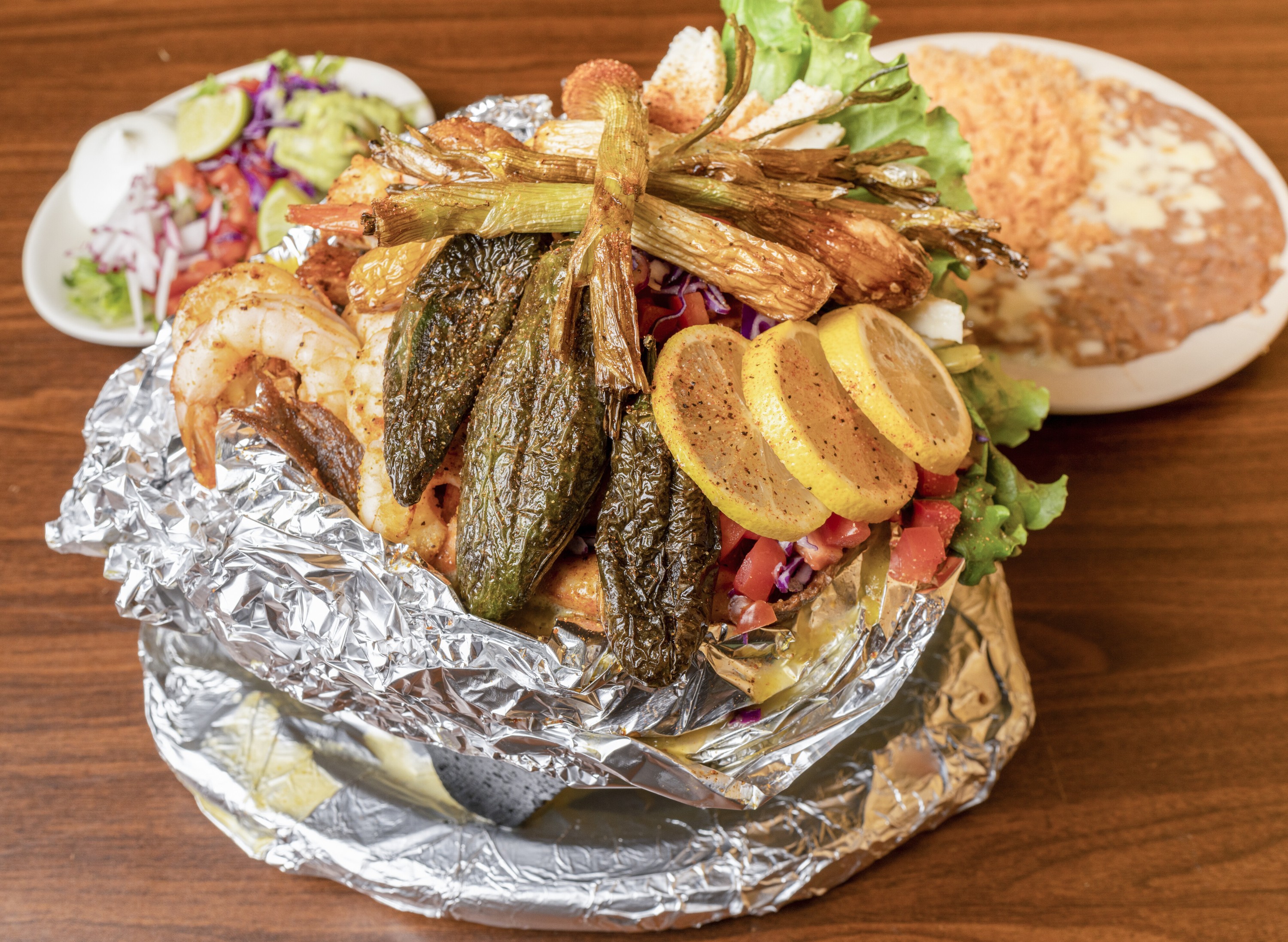 Order Molcajete food online from Maria Mexican Restaurant store, Ogden on bringmethat.com