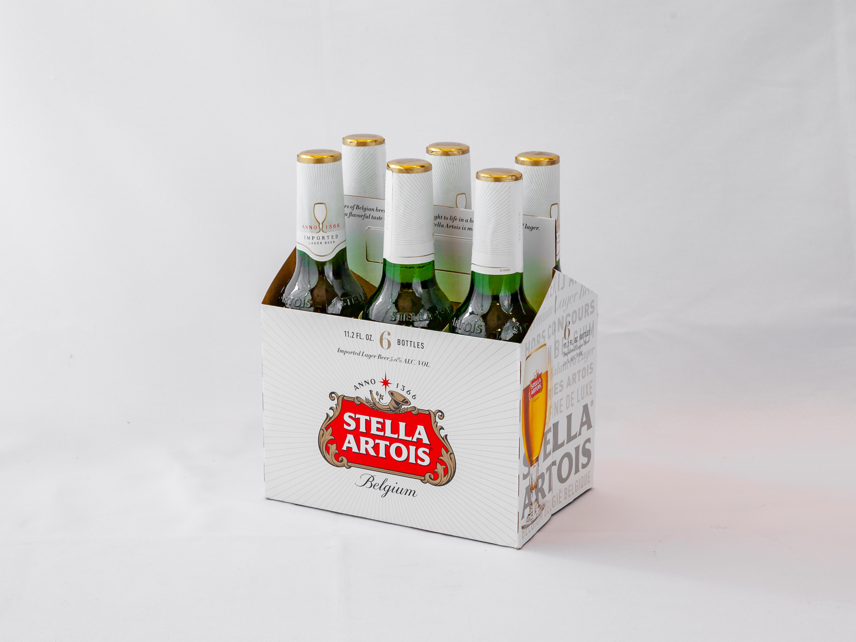 Order Stella Artois, 6pk-12 oz. Bottle Beer food online from Galleria liqueurs (old town) store, Chicago on bringmethat.com