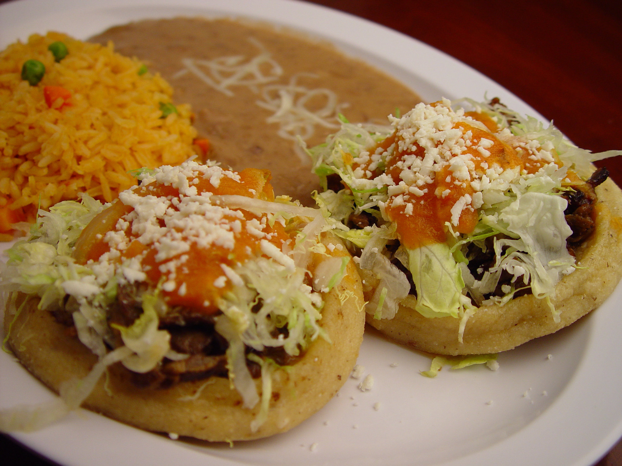 Order 25. 2 Sopes Plate food online from Rodeo Mexican Grill store, Los Angeles on bringmethat.com