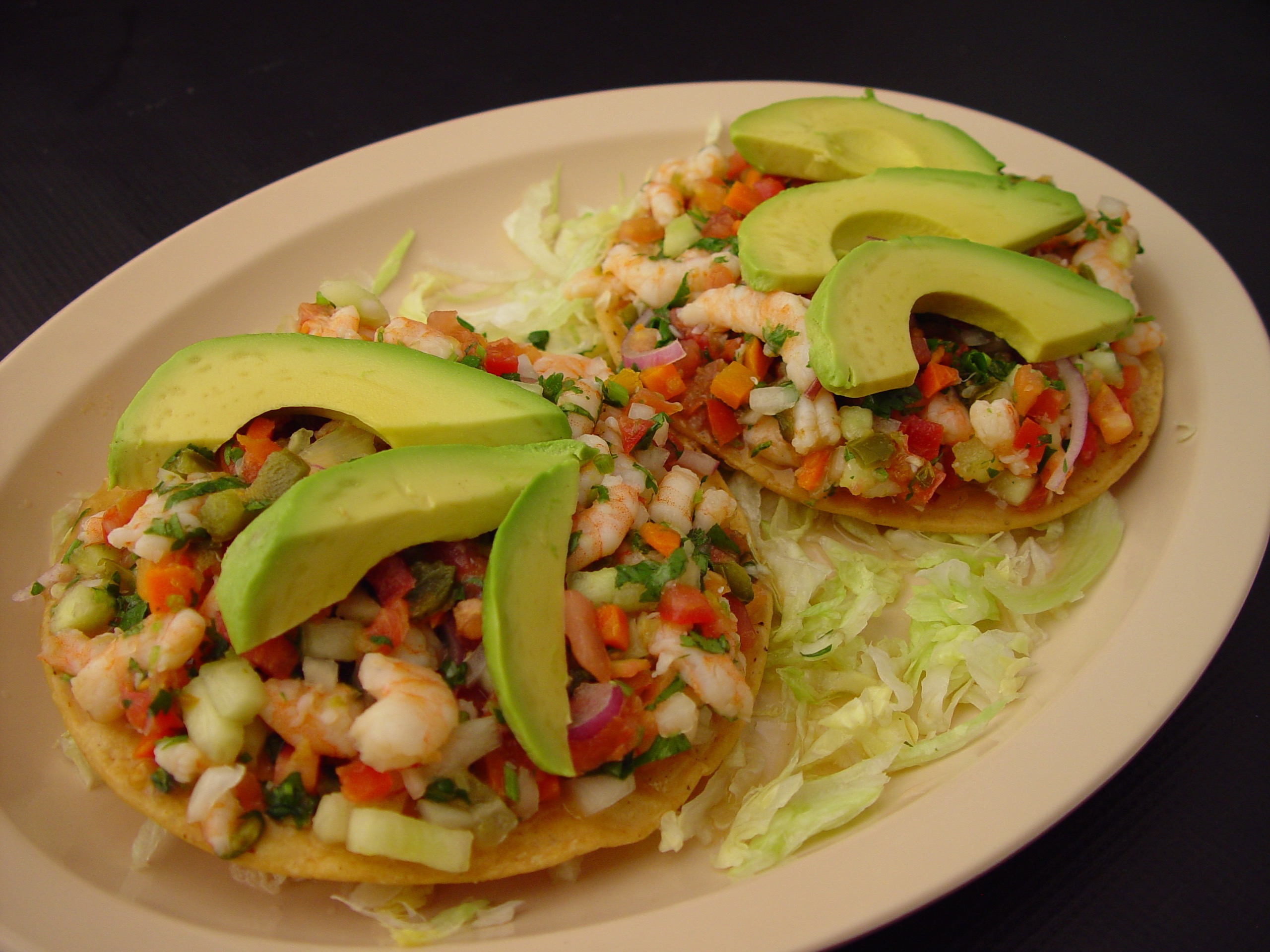 Order 2 Tostada Ceviche Combo food online from Tacos El Canelo No 2 store, Los Angeles on bringmethat.com