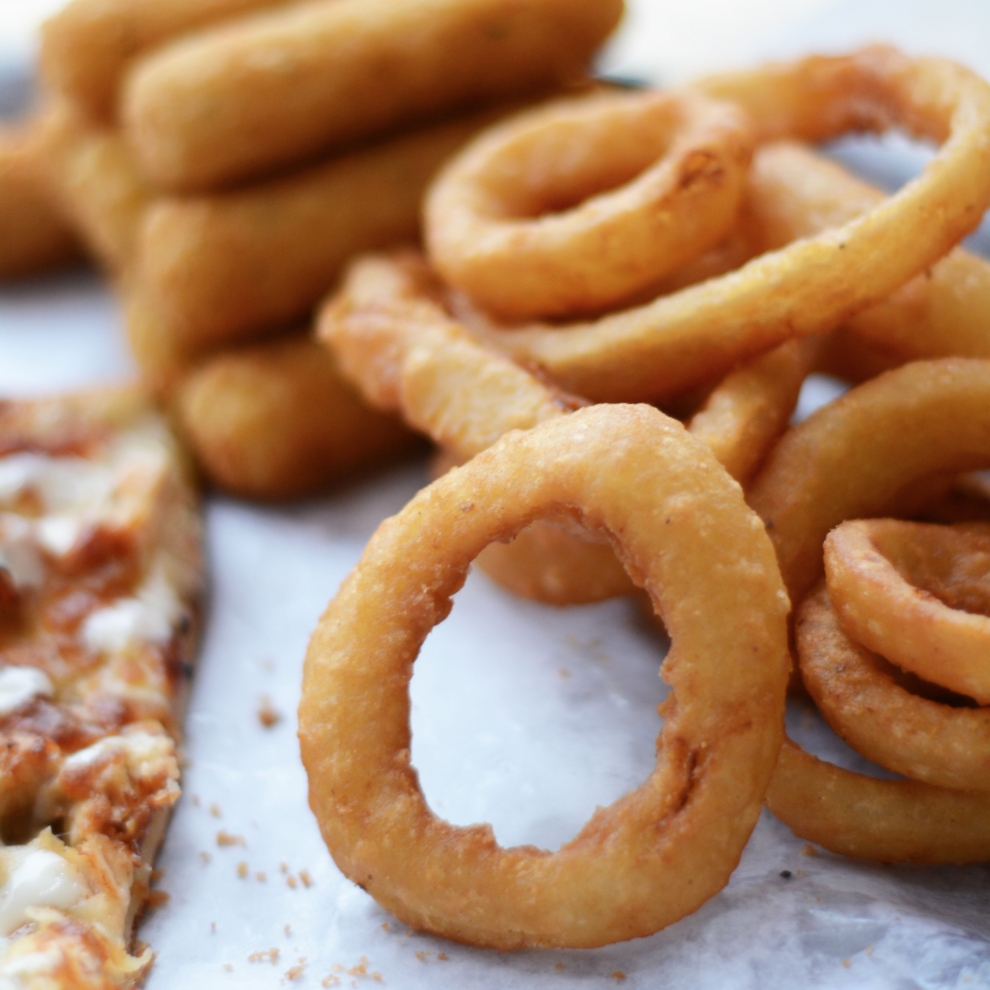 Order Onion Rings food online from Rock City Pizza store, Allston on bringmethat.com