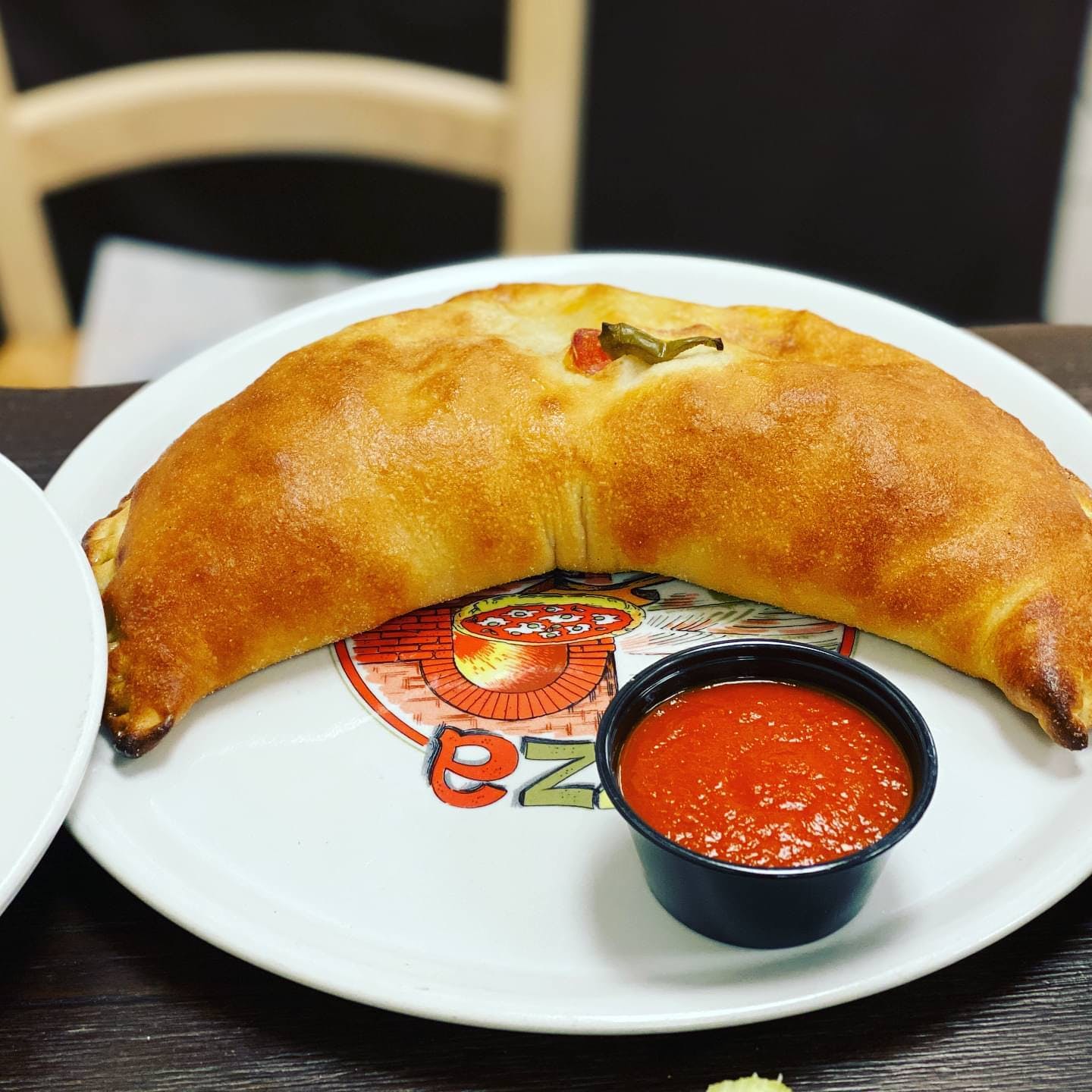 Order Spinach Calzone - Personal food online from Tonys Pizzeria & Italian Restaurant store, Audubon on bringmethat.com