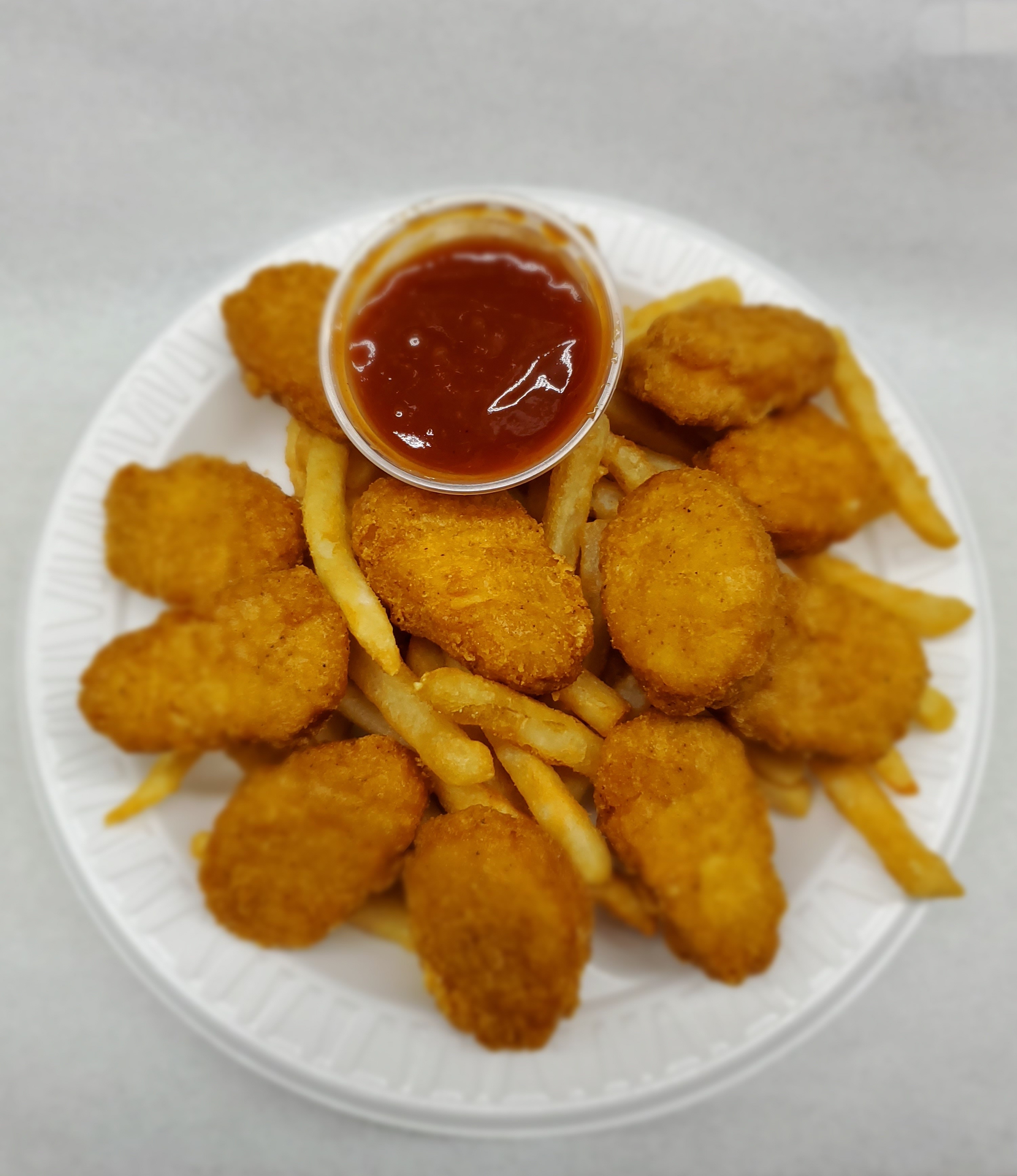Order 6 Pieces Chicken Nuggerts food online from Rudy's Grill store, Summit Argo on bringmethat.com