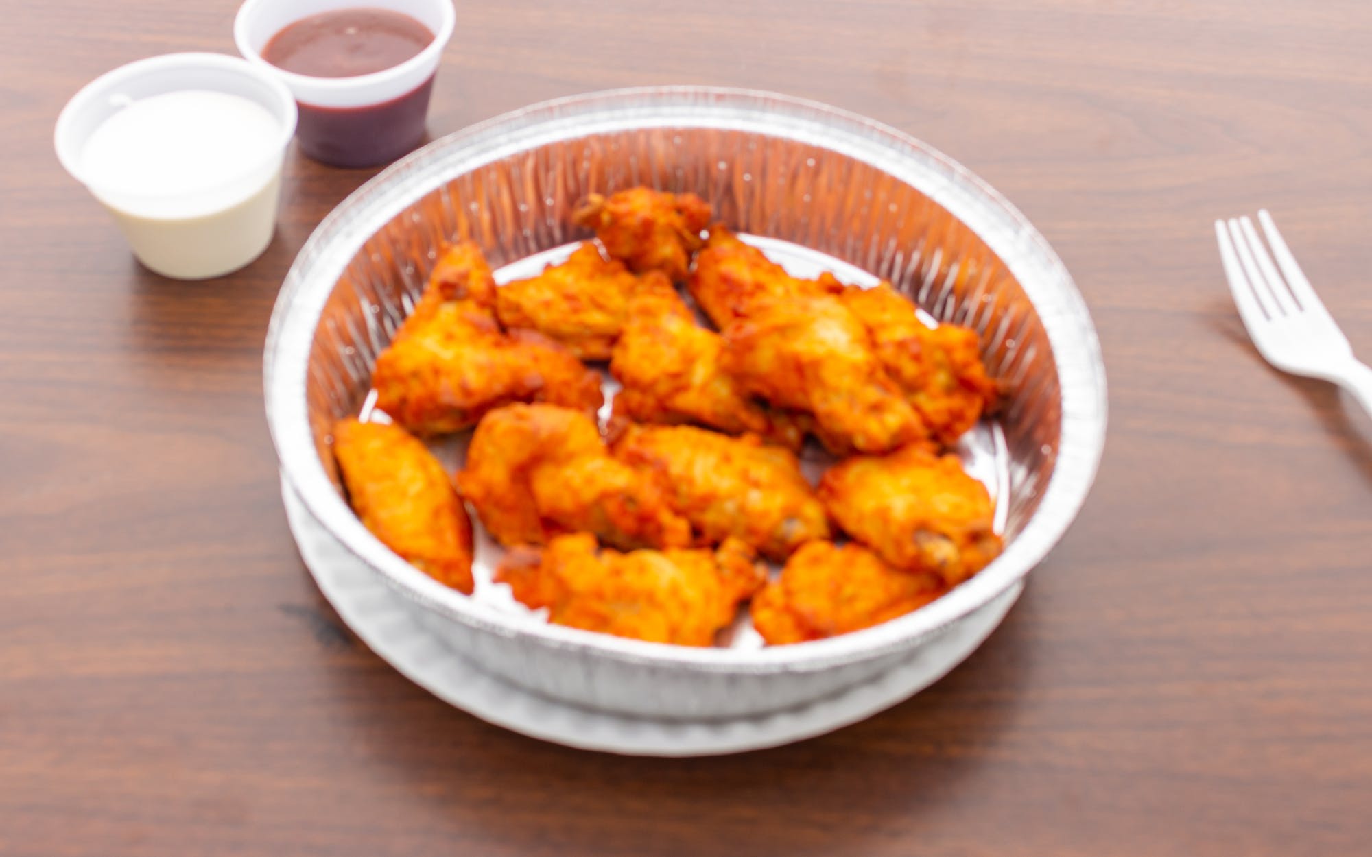 Order 12 Pieces Buffalo Wings food online from Donna Pizza store, Palisades Park on bringmethat.com