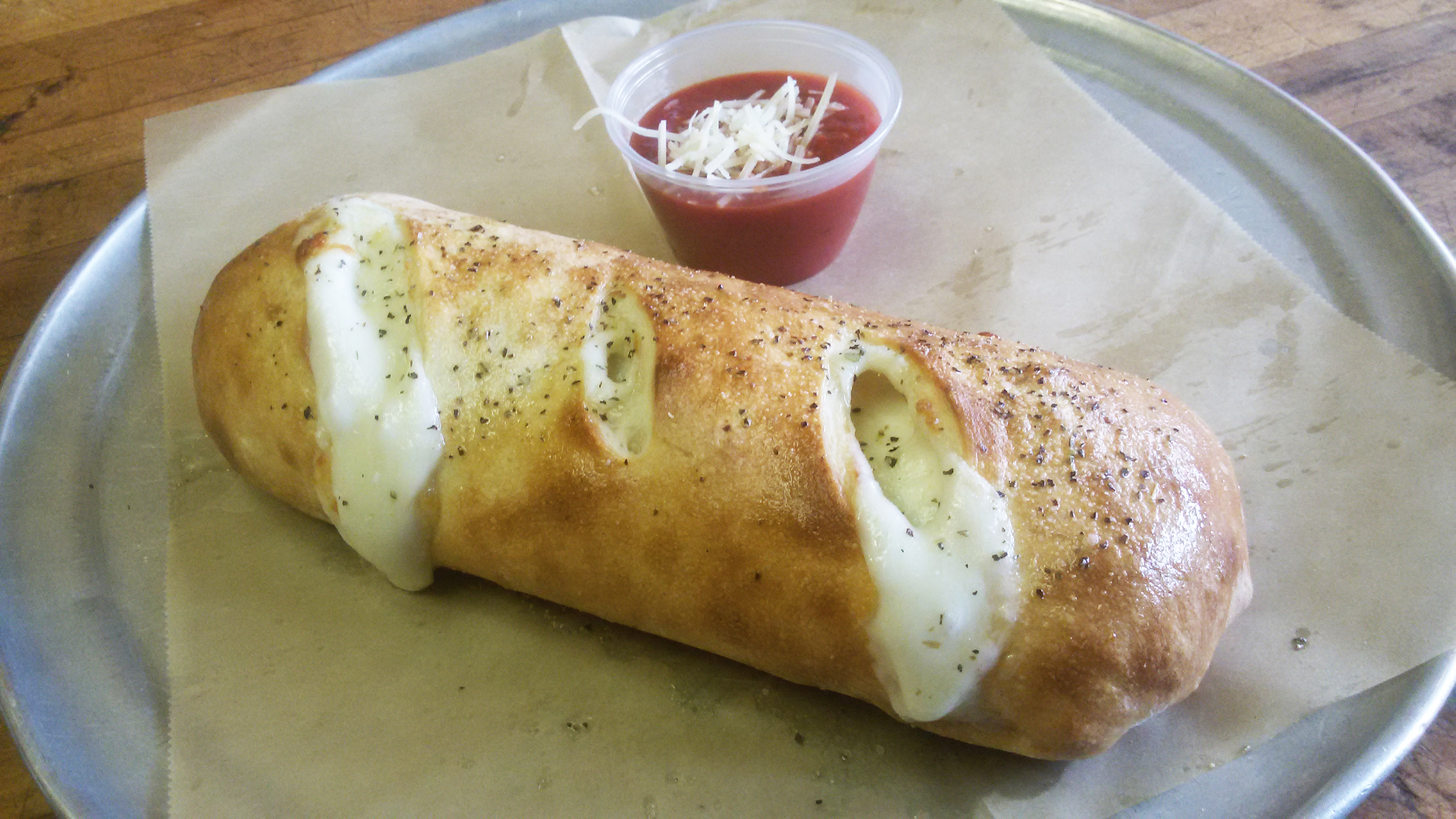 Order Stromboli food online from Mojo Pizza and Pub store, Decatur on bringmethat.com