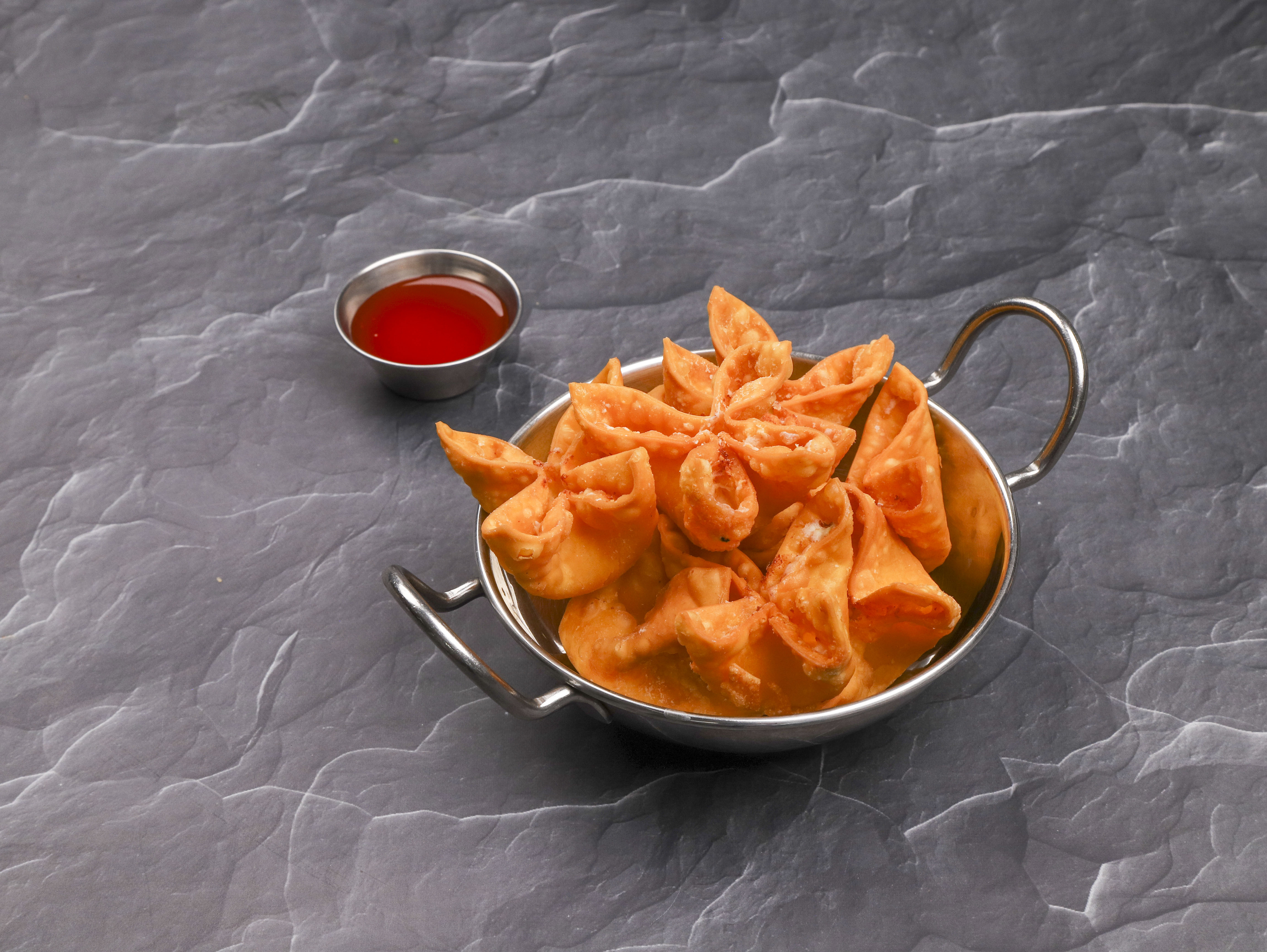 Order 8 Pieces Fried Crab Rangoons food online from East Wok store, West Palm Beach on bringmethat.com