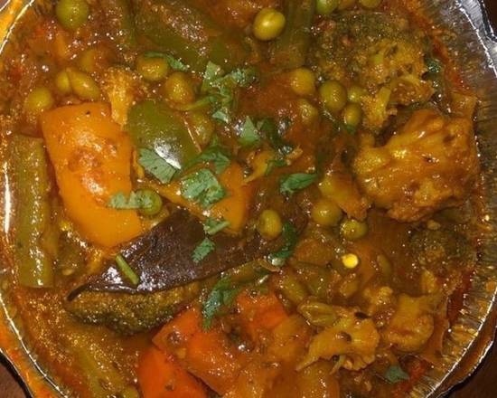 Order Mixed Vegetable Curry food online from Sangam Restaurant store, Ithica on bringmethat.com