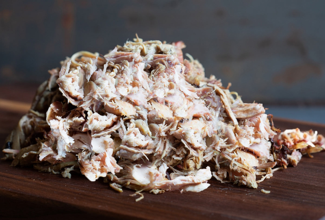 Order Pulled Chicken 1 lb food online from Red Hot & Blue store, North Richland Hills on bringmethat.com