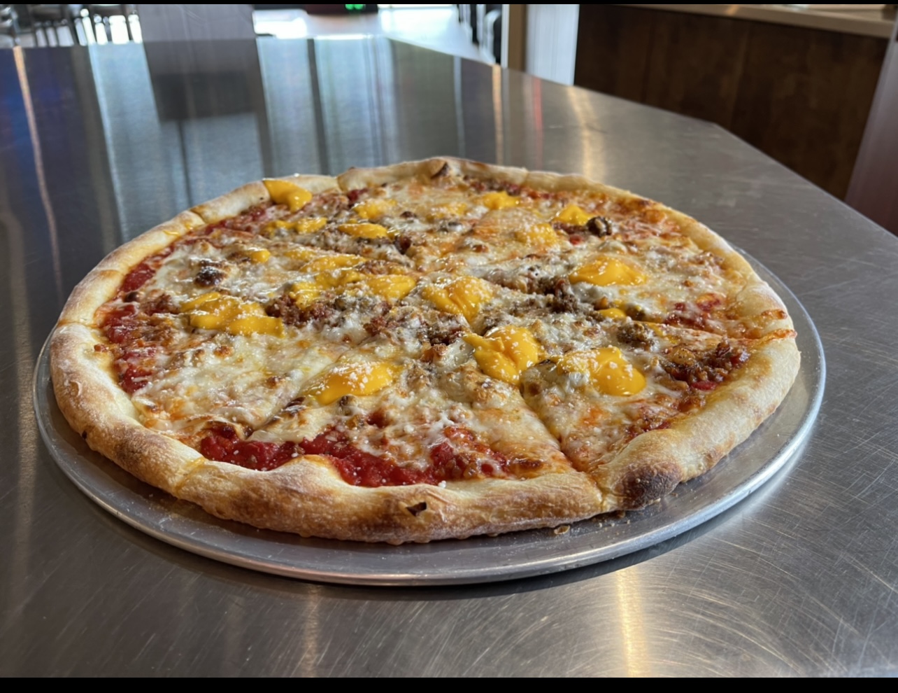 Order Bacon Cheeseburger Pizza food online from Johnny's Pizza store, Cary on bringmethat.com
