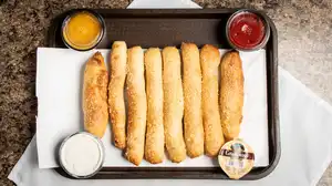 Order Breadsticks food online from Dolly Pizza Walled Lake store, Walled Lake on bringmethat.com