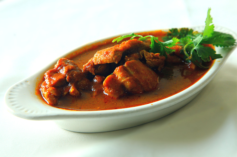 Order Goat Vindaloo food online from Ruchi Indian Restaurant store, Bellevue on bringmethat.com