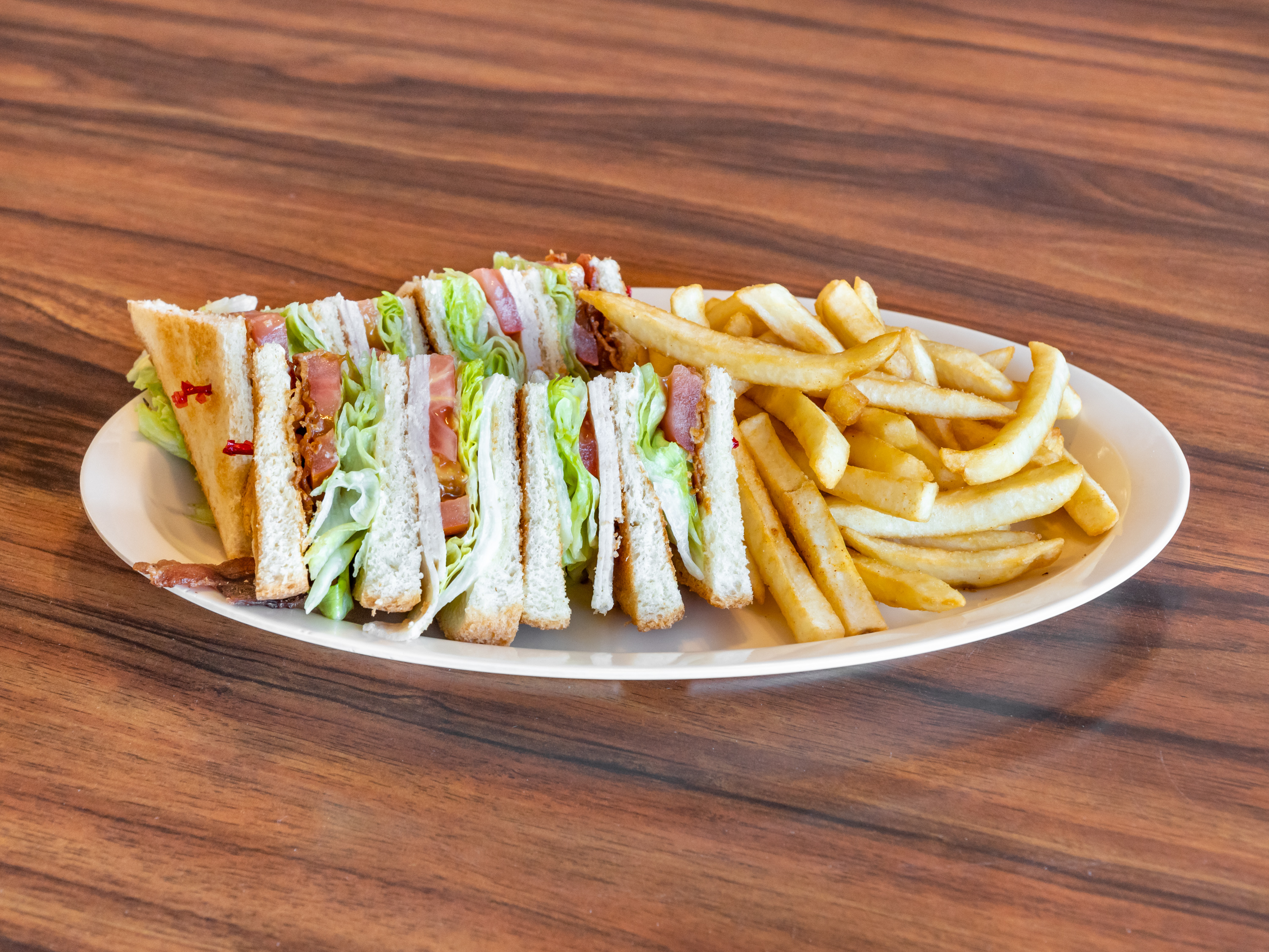 Order Club Sandwich with fries and drink food online from Golden Burger store, Long Beach on bringmethat.com