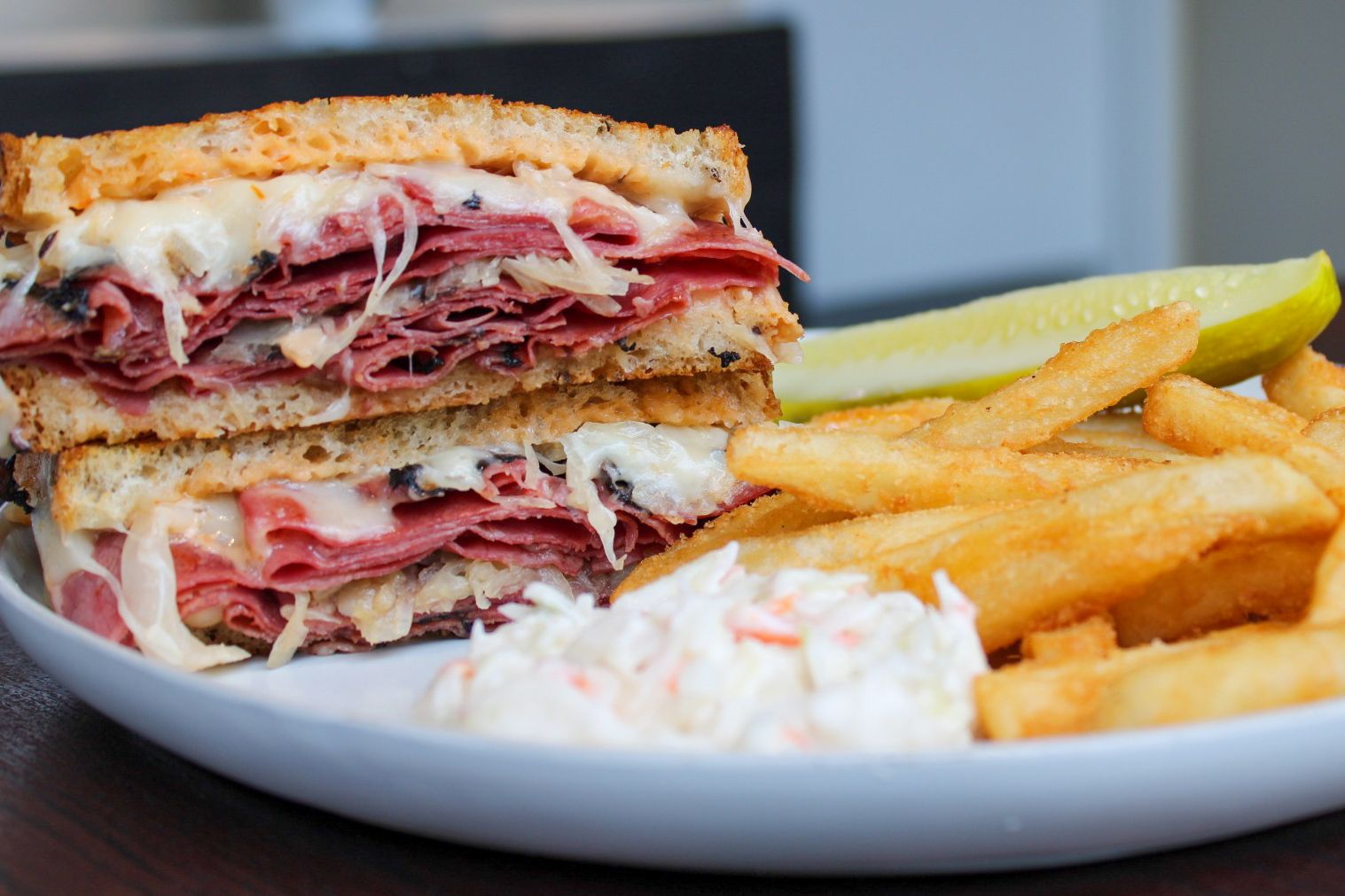 Order Corn Beef Reuben with Dill Pickle and Fries food online from Corner Cafe store, Annapolis on bringmethat.com