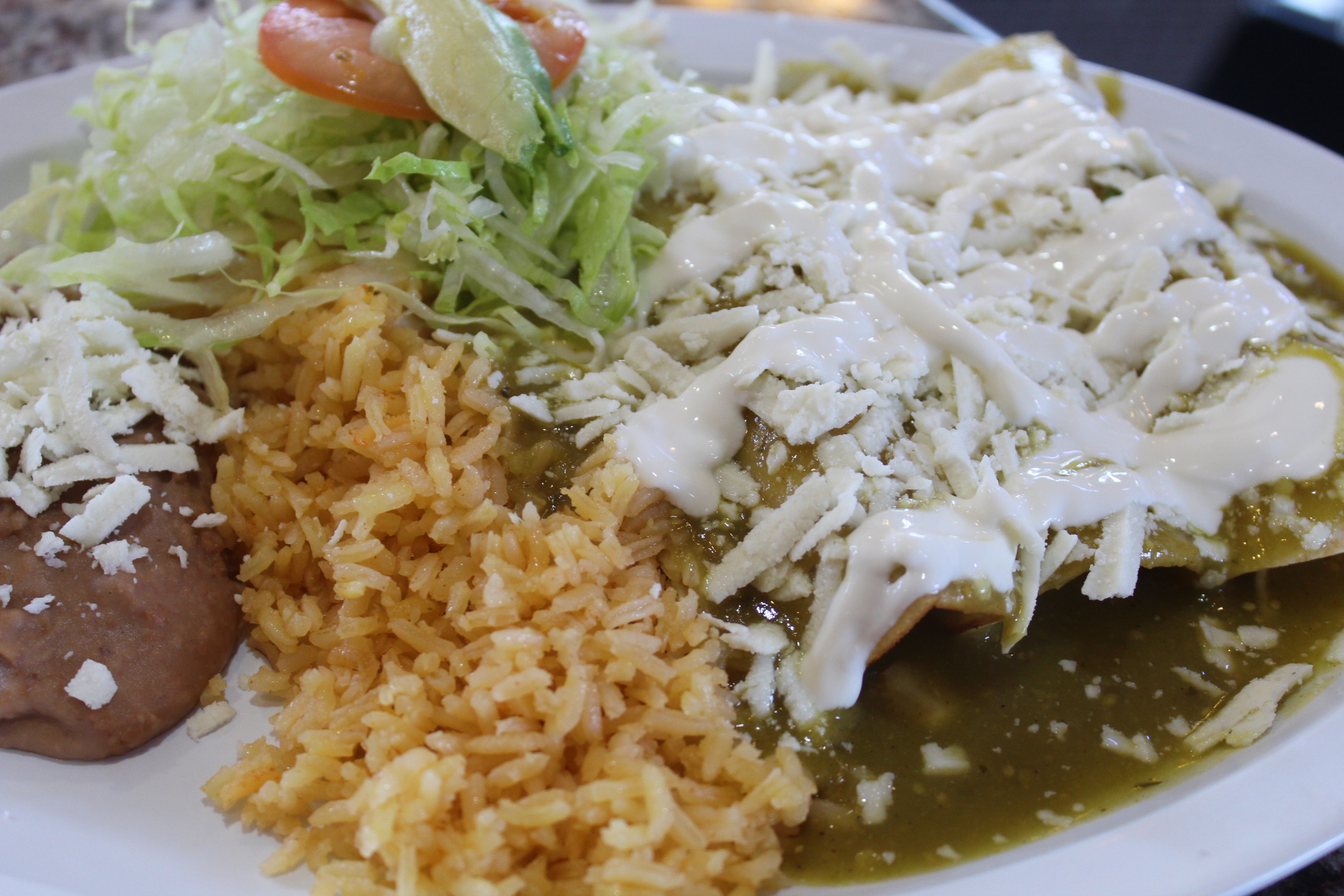 Order Enchilada Plate food online from La Paloma Taqueria store, Balch Springs on bringmethat.com