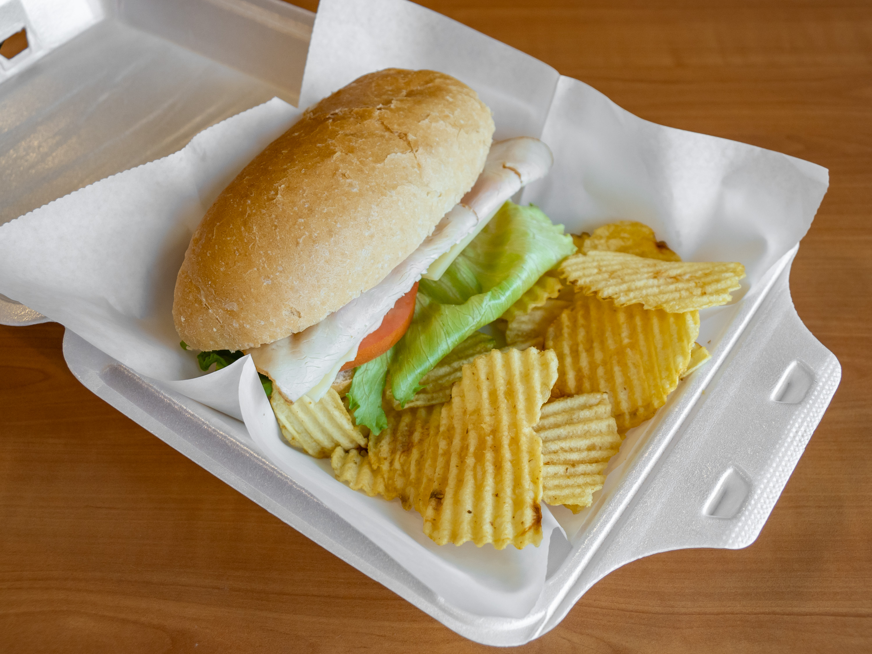 Order 10. Sub Sandwich with Chips Lunch food online from Blaze Coffeehouse store, Fort Stewart on bringmethat.com