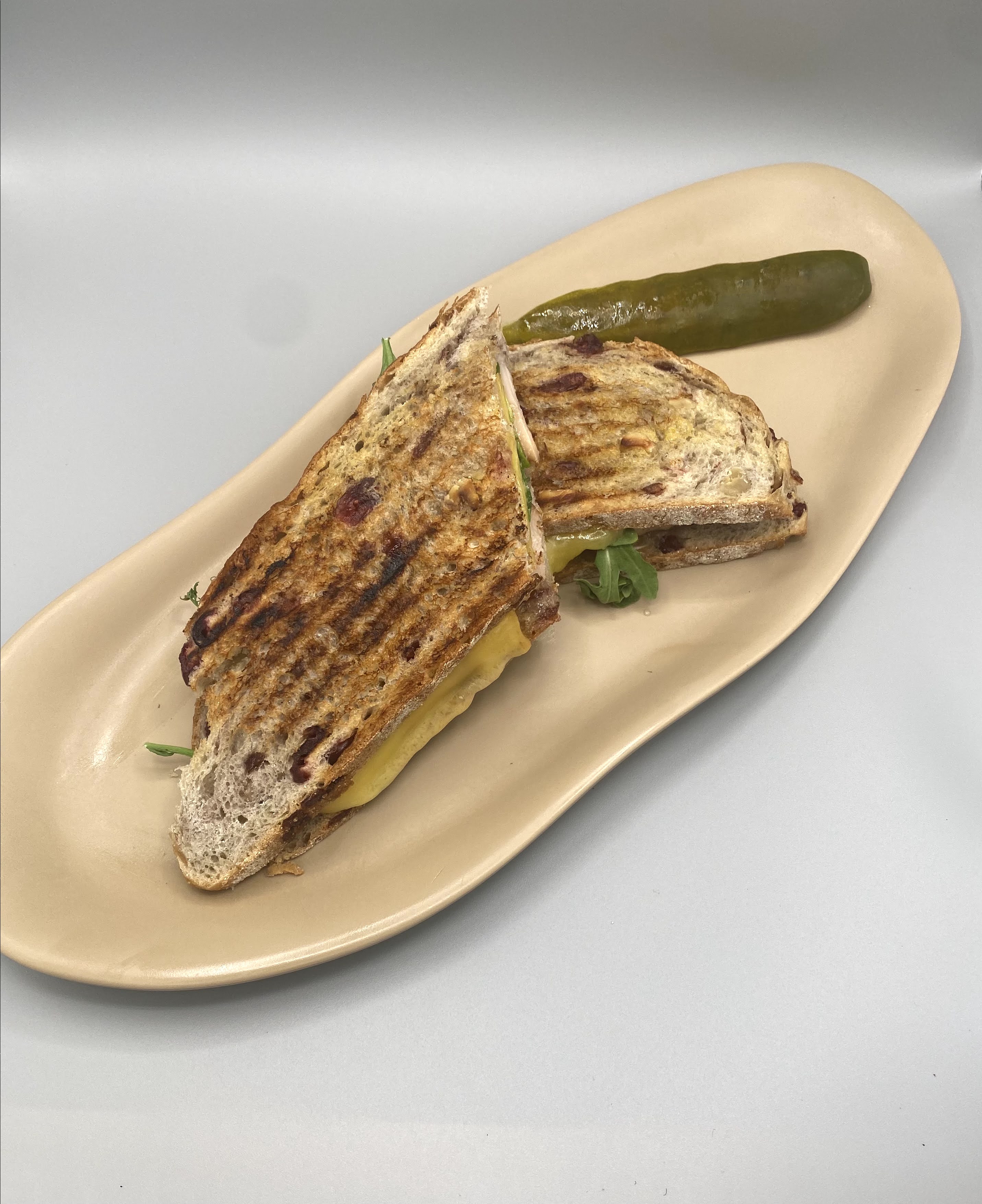 Order Grilled Turkey Panini food online from Zuppa Deli store, Wexford on bringmethat.com