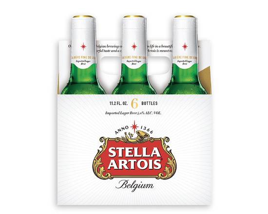 Order Stella Artois, 6pk-12oz bottle (5.2% ABV) food online from Ogden Wine & Spirit store, Naperville on bringmethat.com